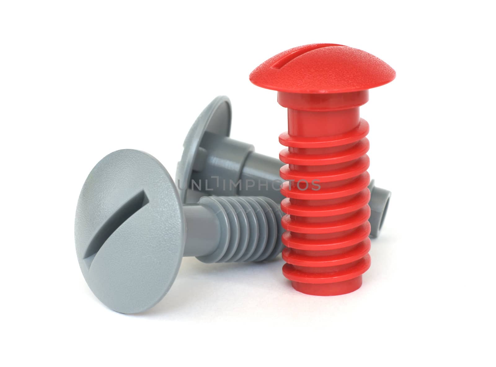 Plastic red and grey bolts, isolated