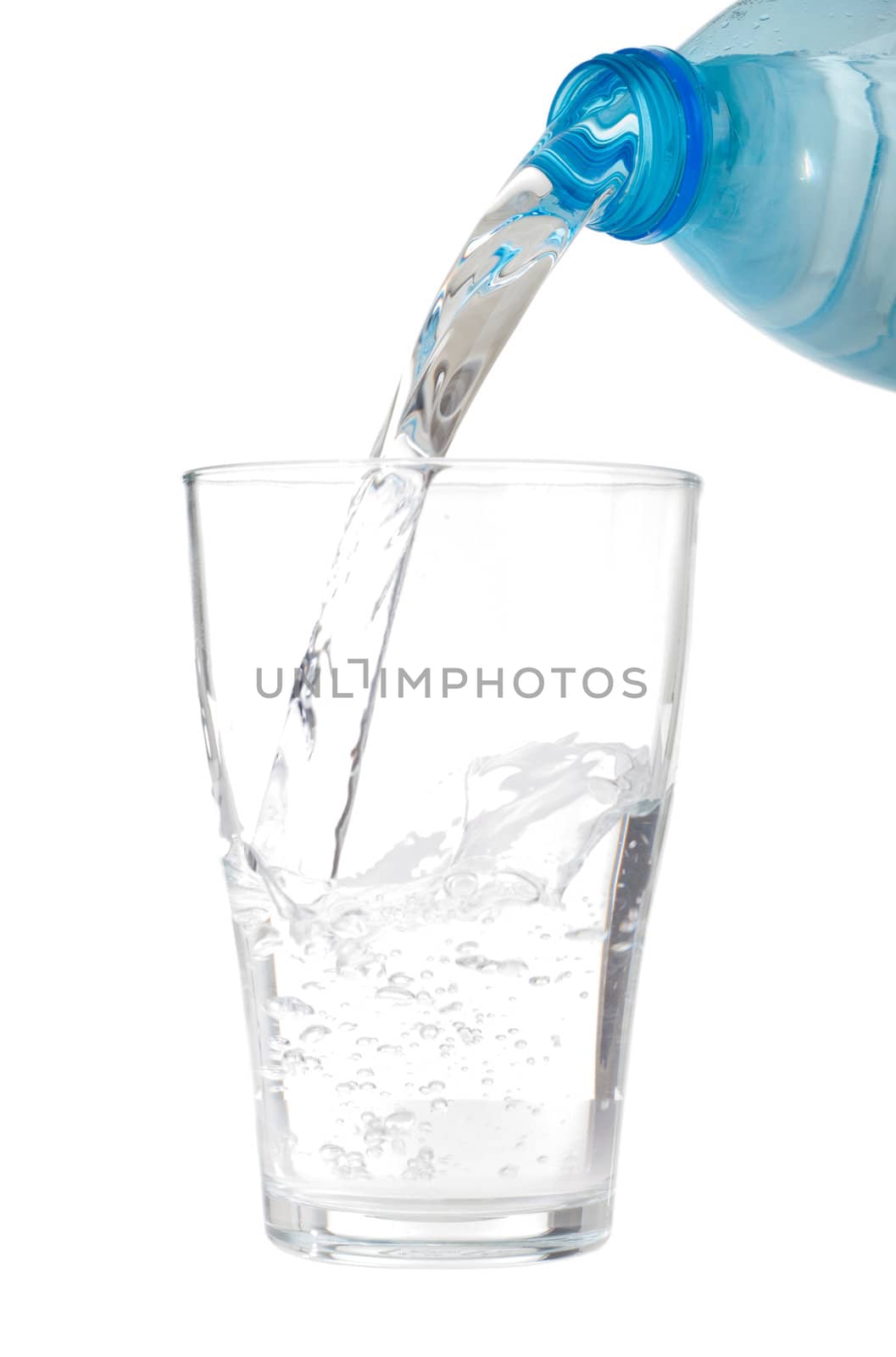 plastic bottle pouring fresh water on a glass (isolated on white background)