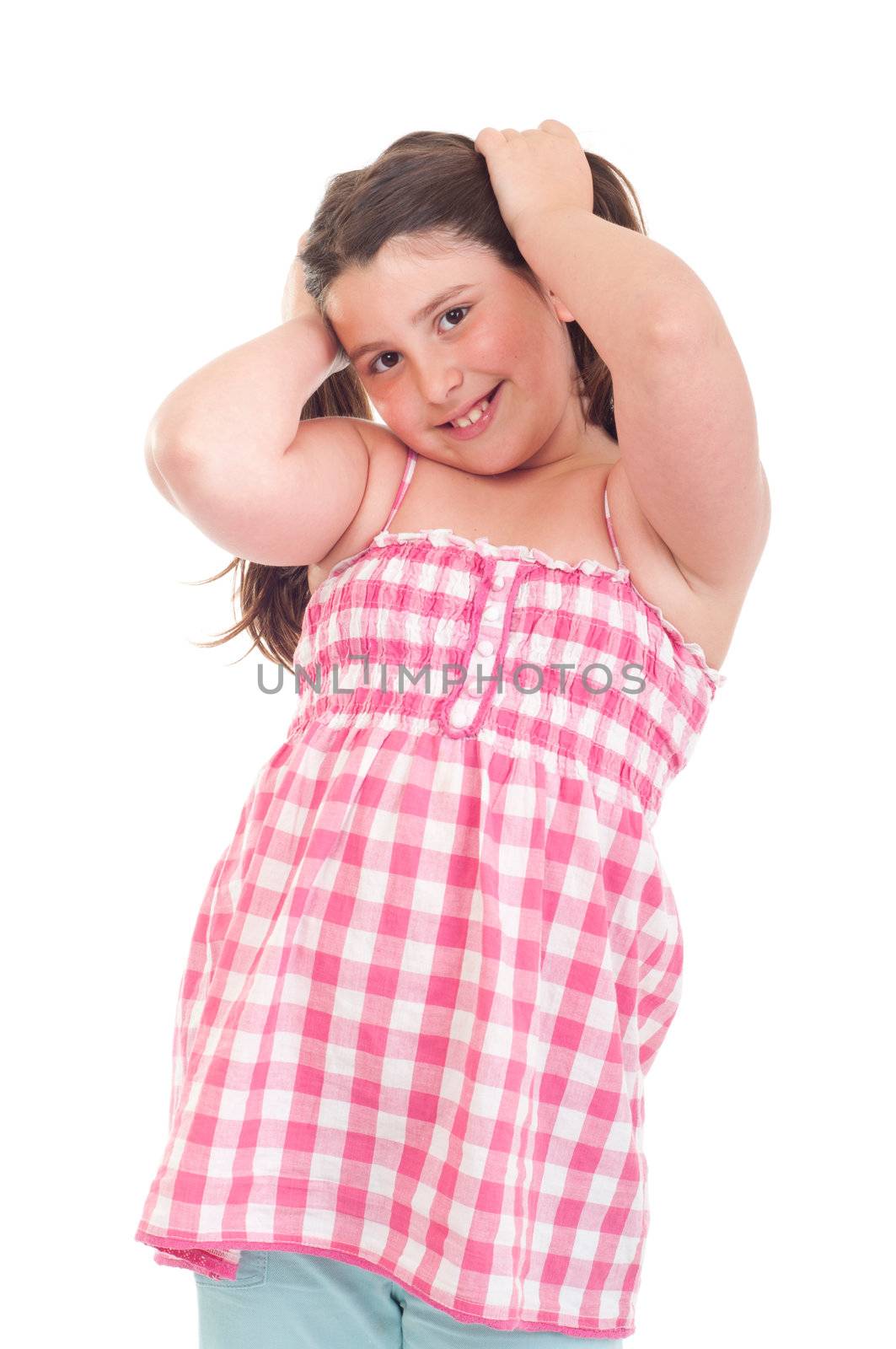 adorable little girl portrait smiling in a pink top (isolated on white background) 