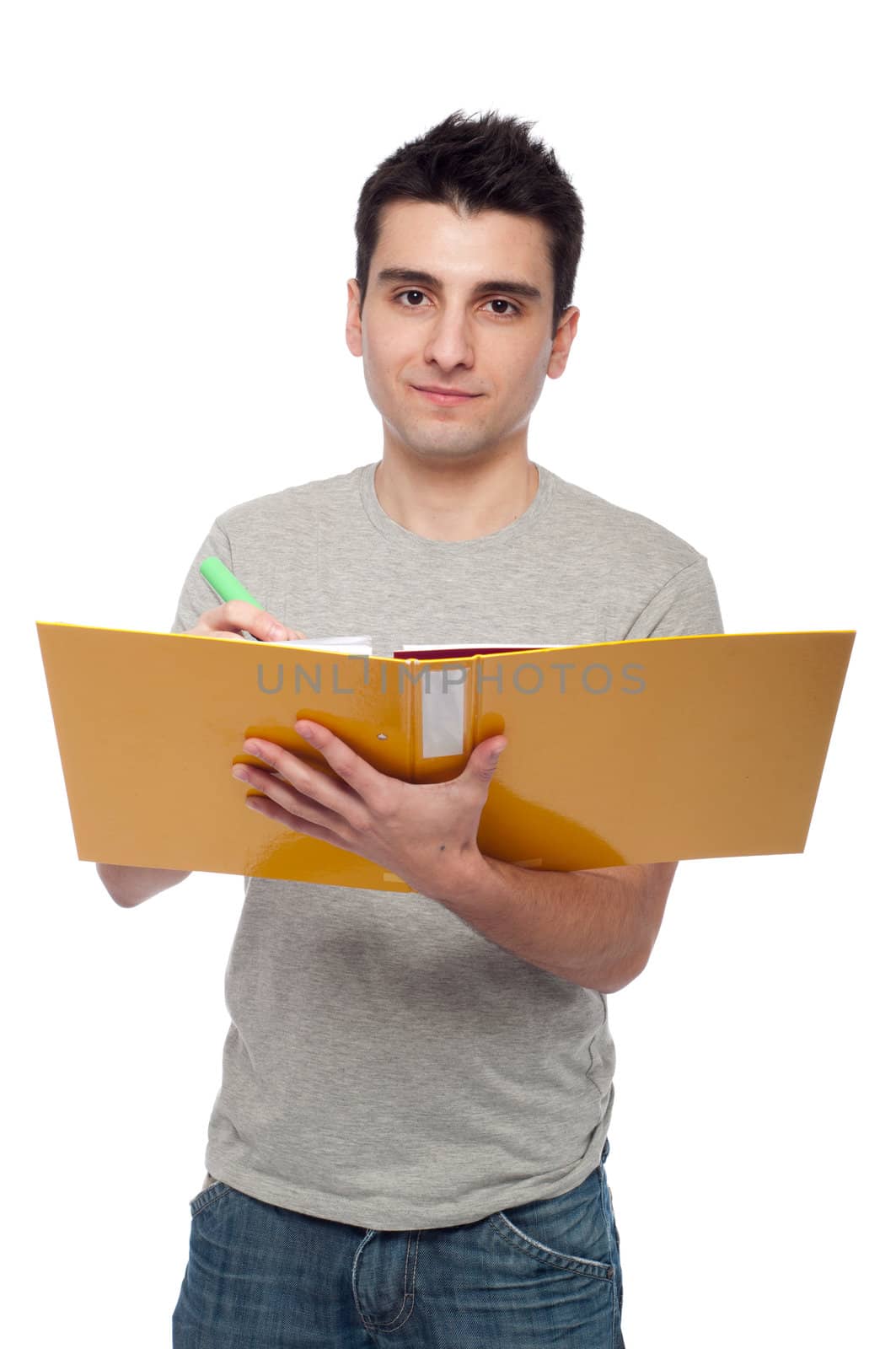 handsome young man studying with a dossier (isolated on white background)