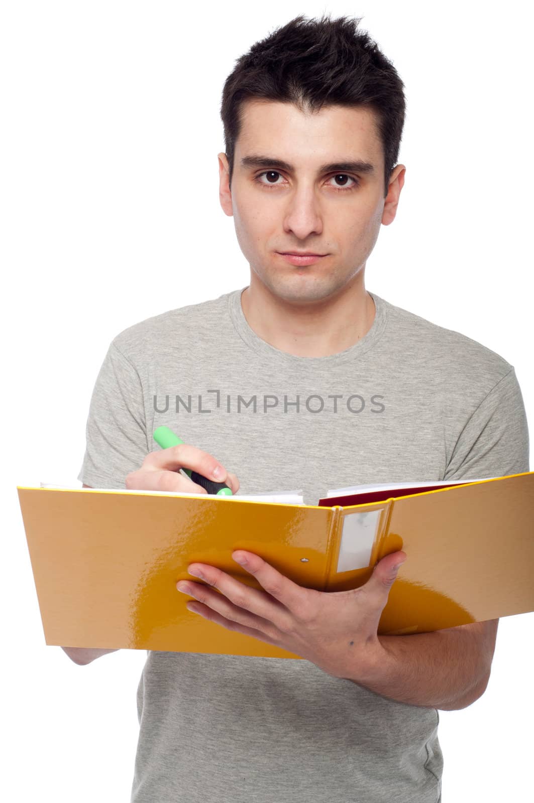 handsome young man studying with a dossier (isolated on white background)