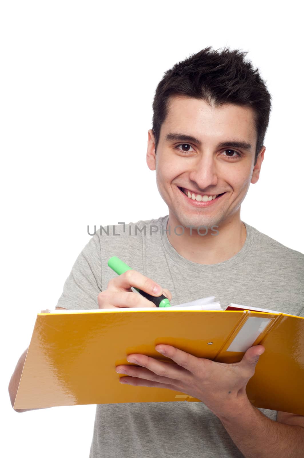 smiling young man studying with a dossier (isolated on white background)