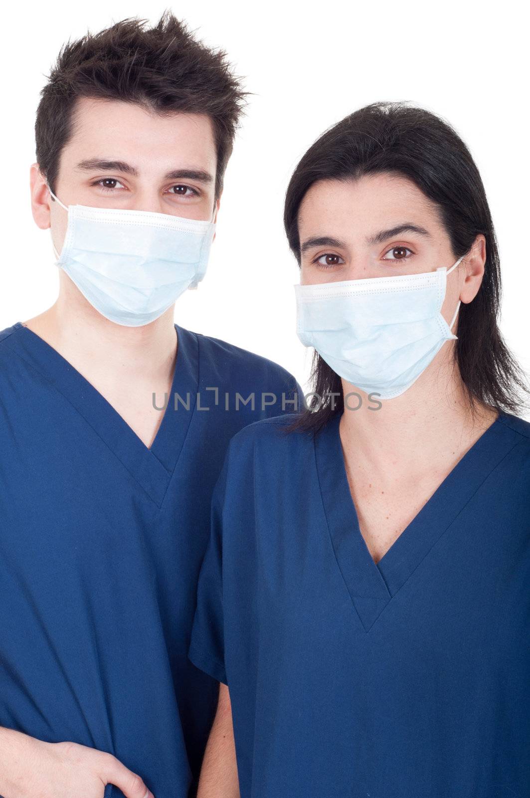 portrait of a team of doctors, man and woman wearing mask and uniform isolated on white background