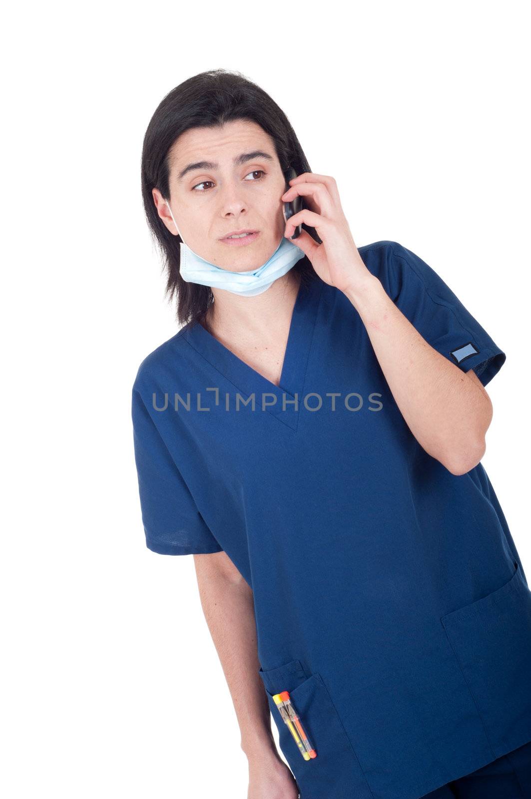 concerned female doctor in uniform talking on the phone (isolated on white background)