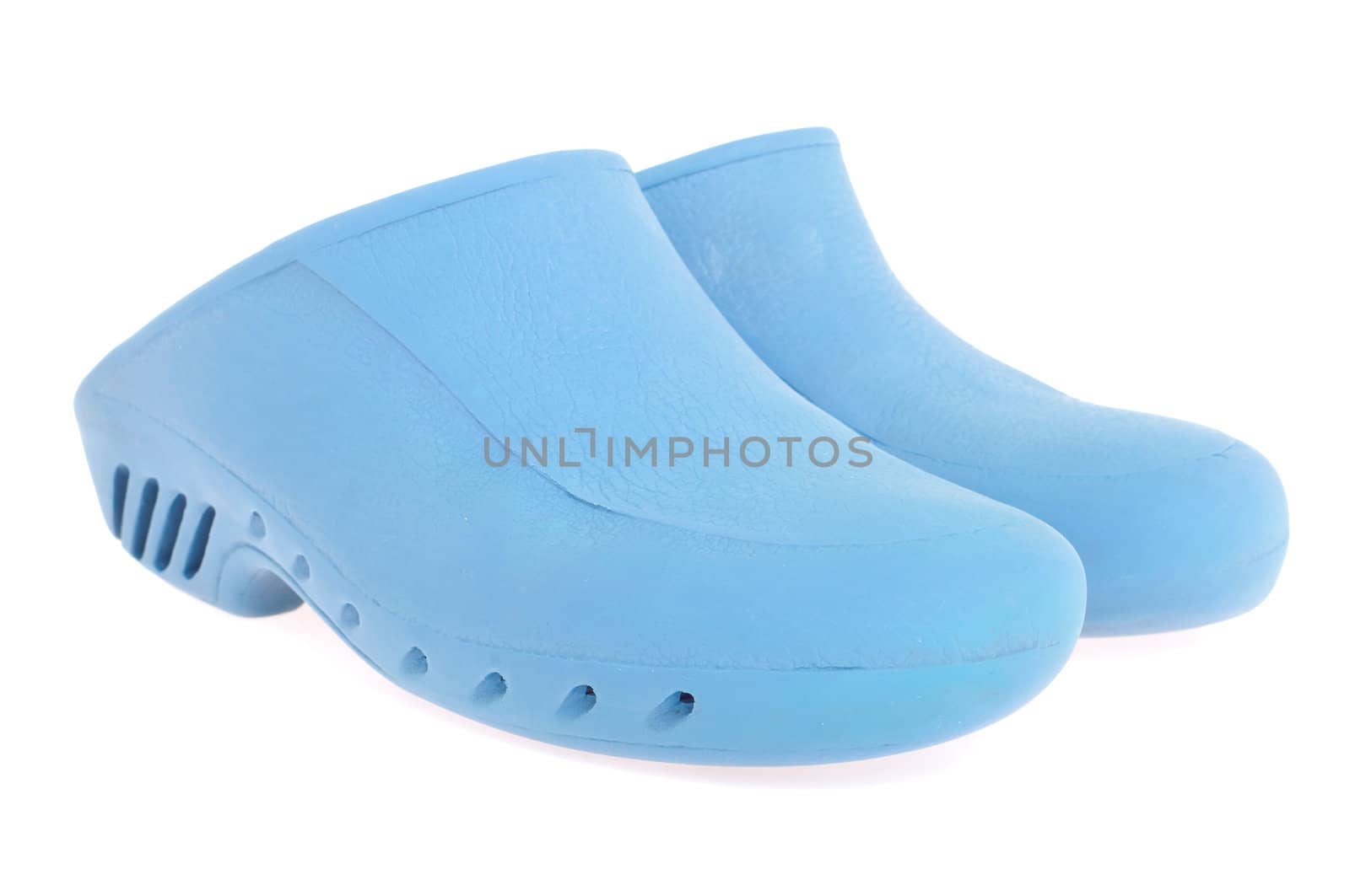 pair of blue anti static surgery clogs isolated on white background