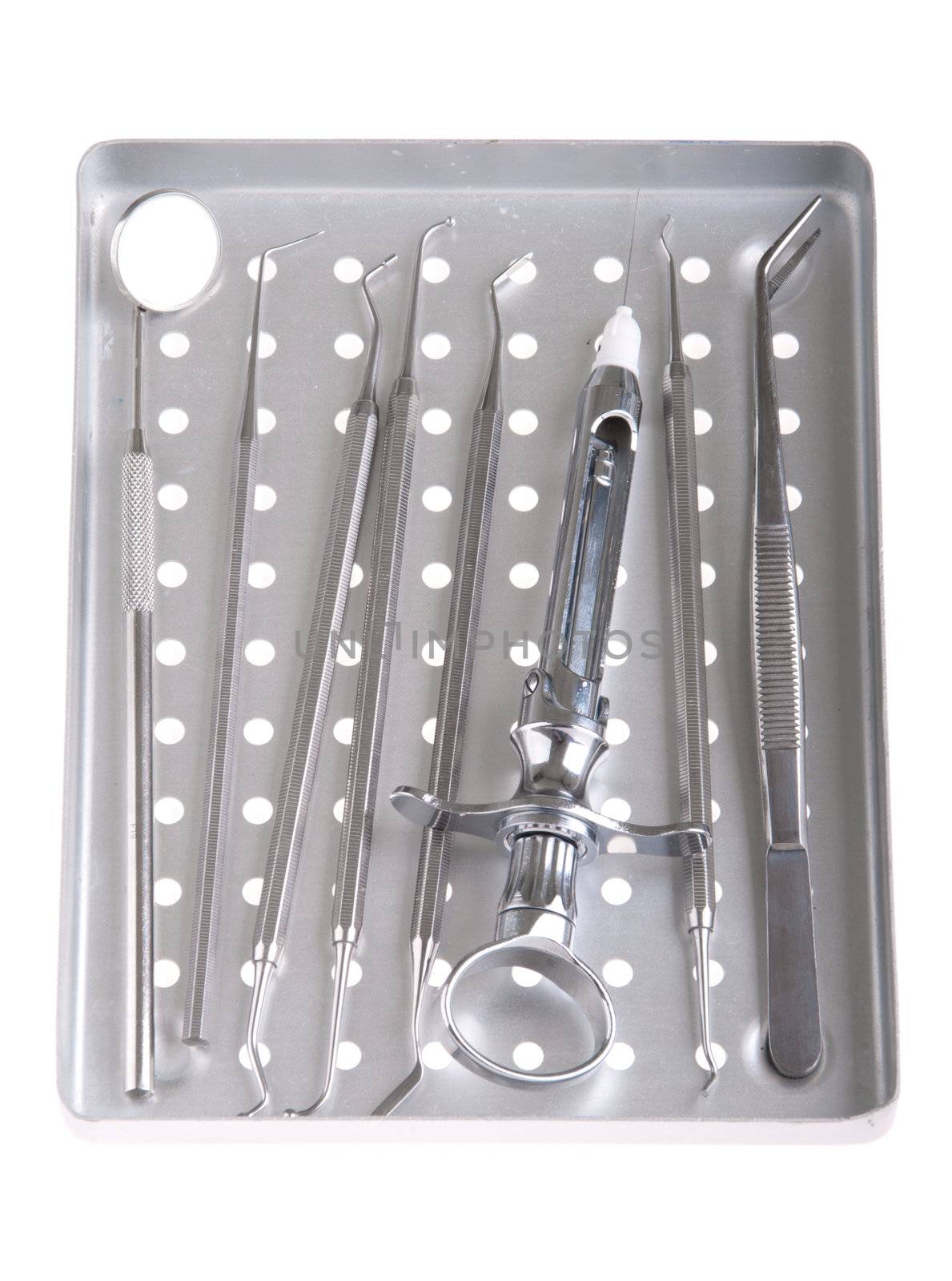 dentistry kit in a metal tray (surgery instruments)