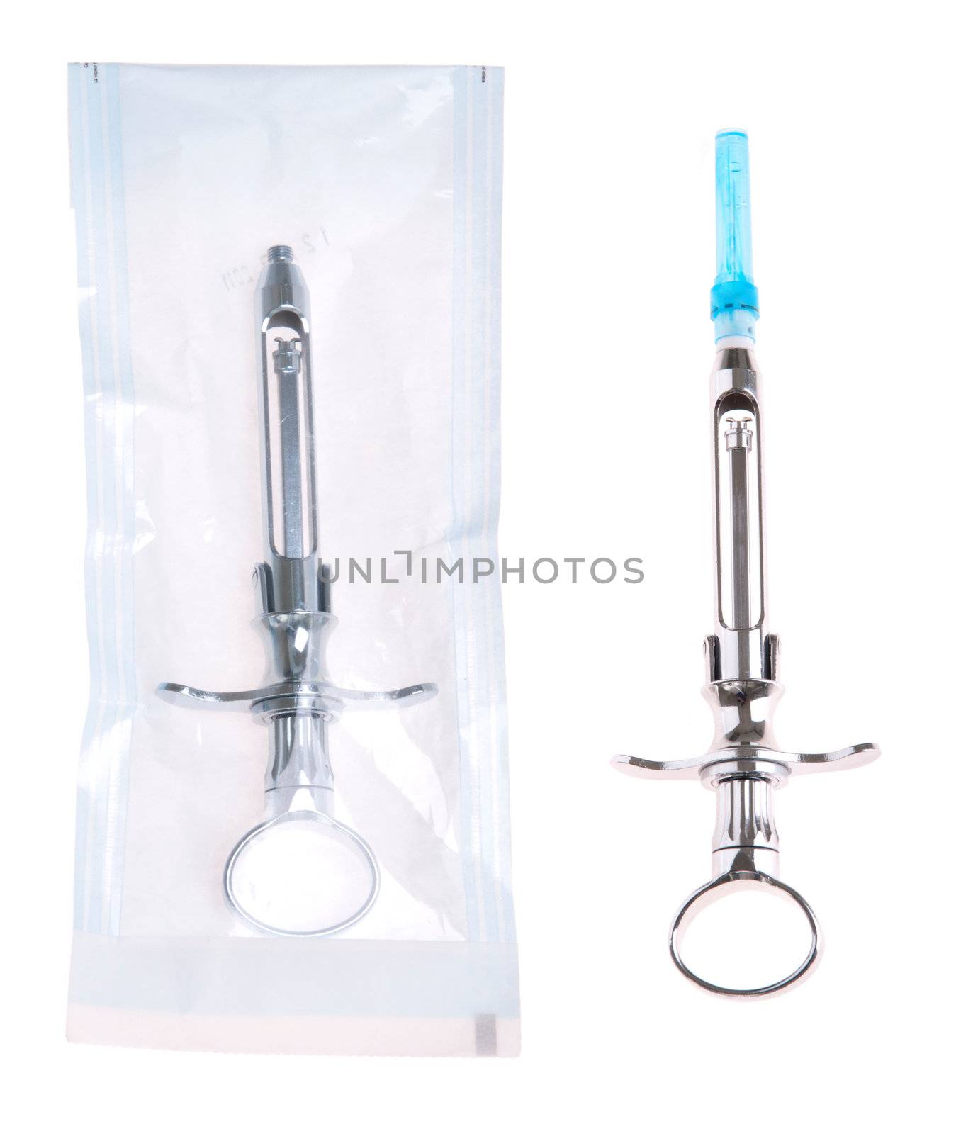 dental syringe in and out a sterilized pouch (isolated on white background)
