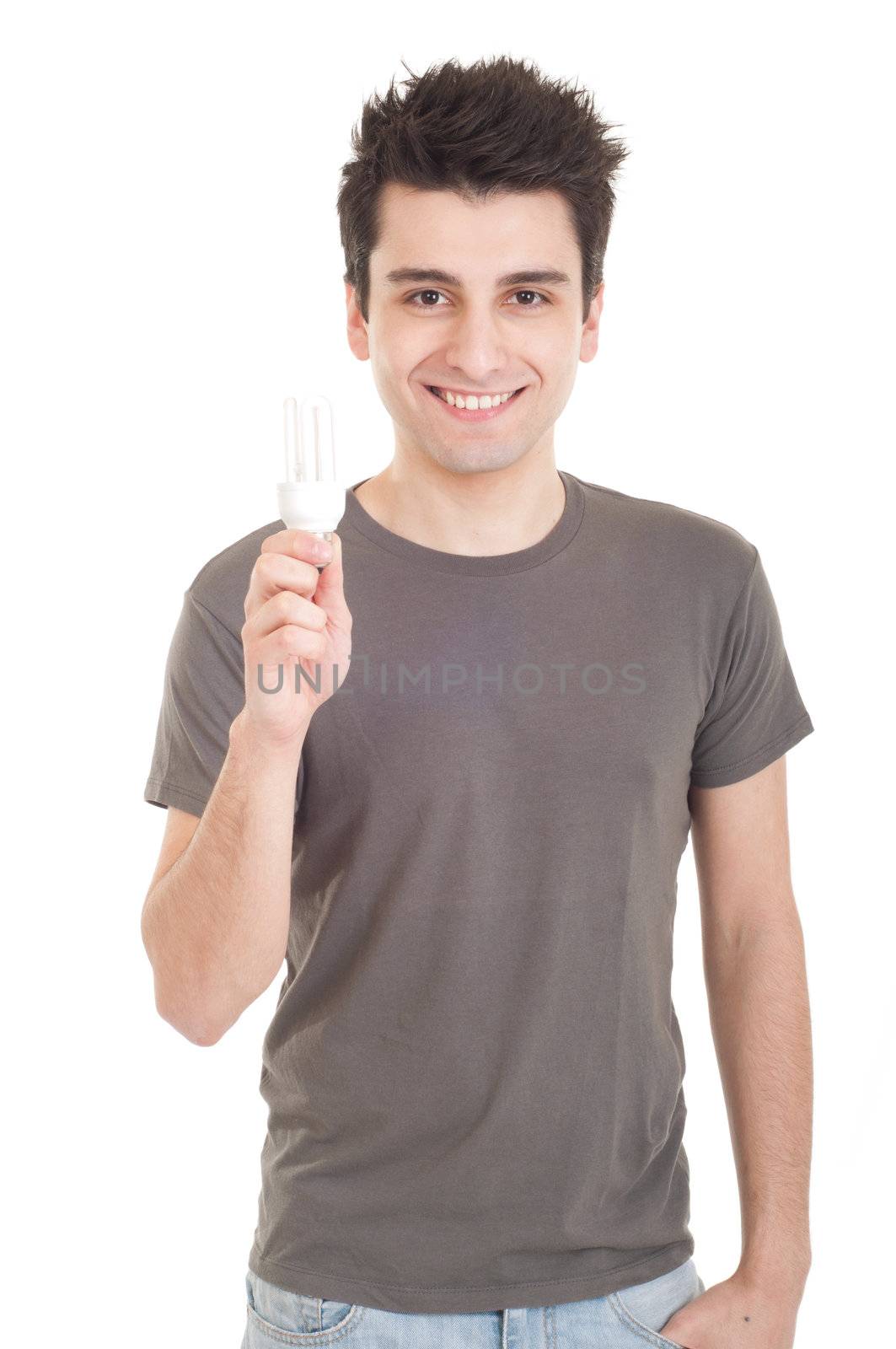 smiling casual man holding a energy-saving lightbulb isolated on white background