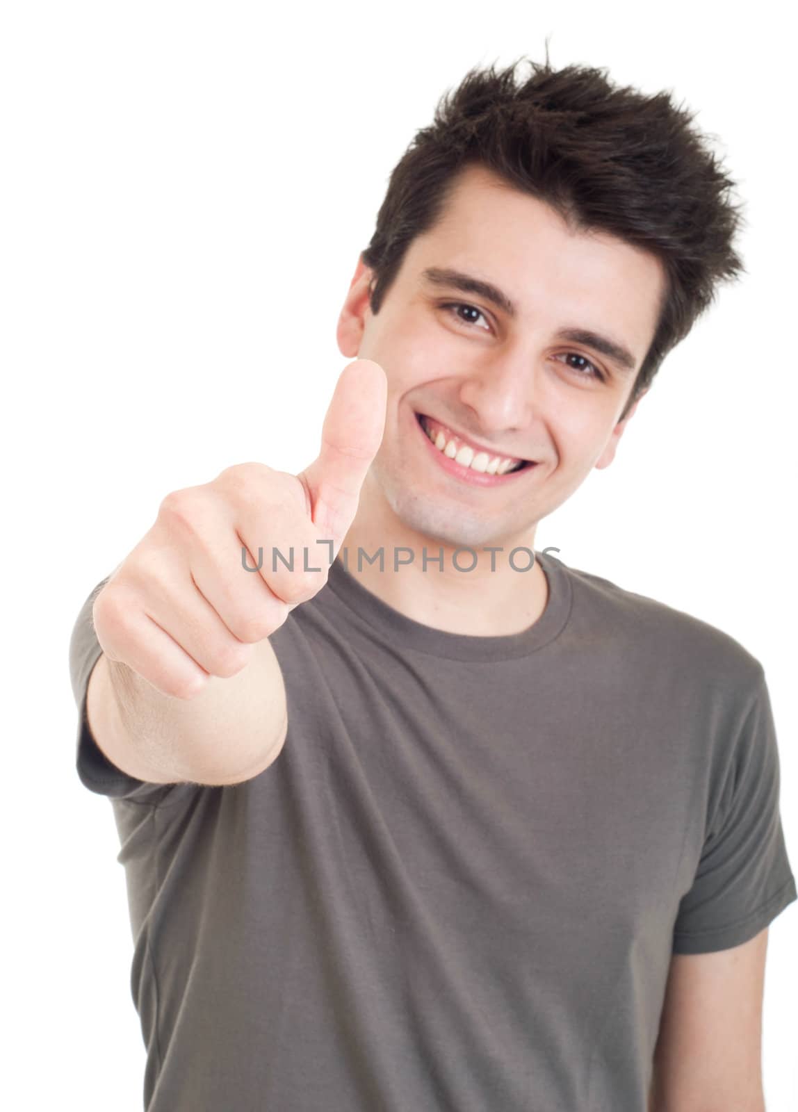 smiling young man with thumbs up (focus on hand) on an isolated white background