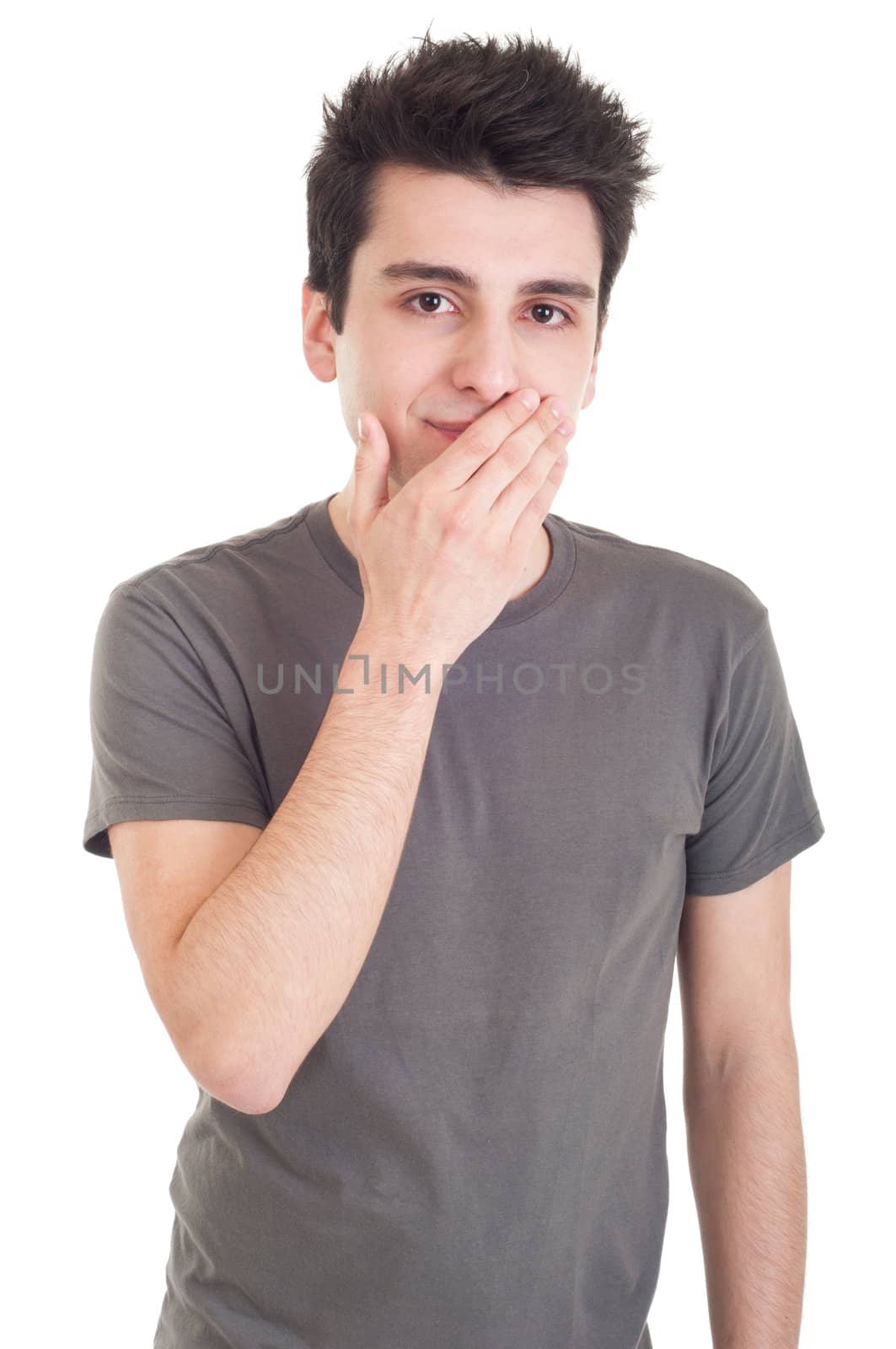 exhausted young man yawning isolated on white background