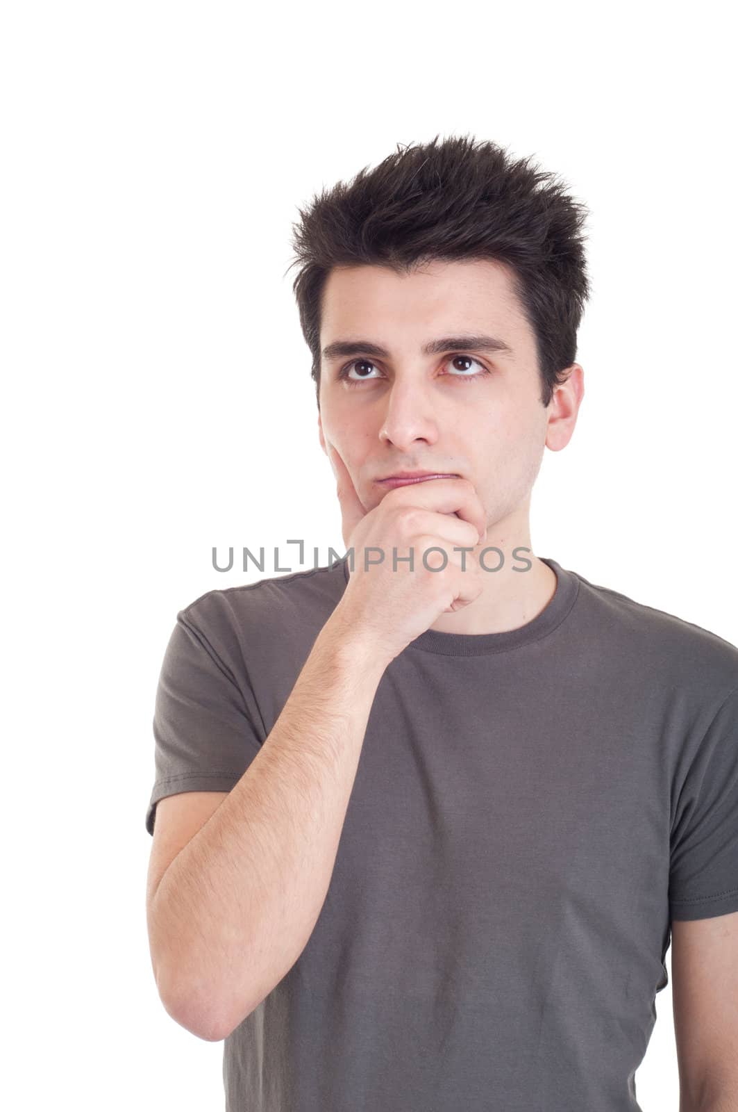 young casual man with a pensive expression isolated on white background