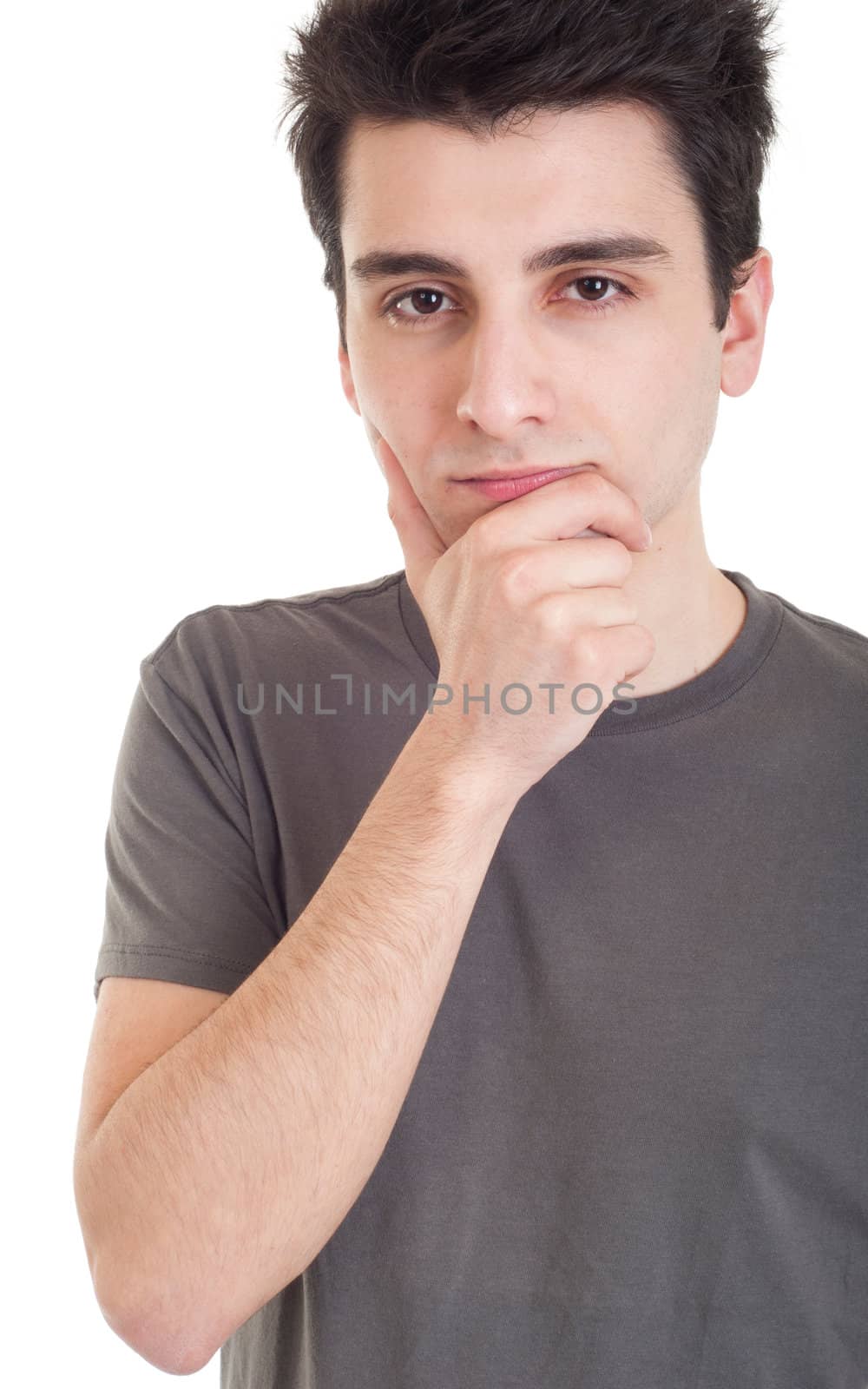 young casual man with a pensive expression isolated on white background