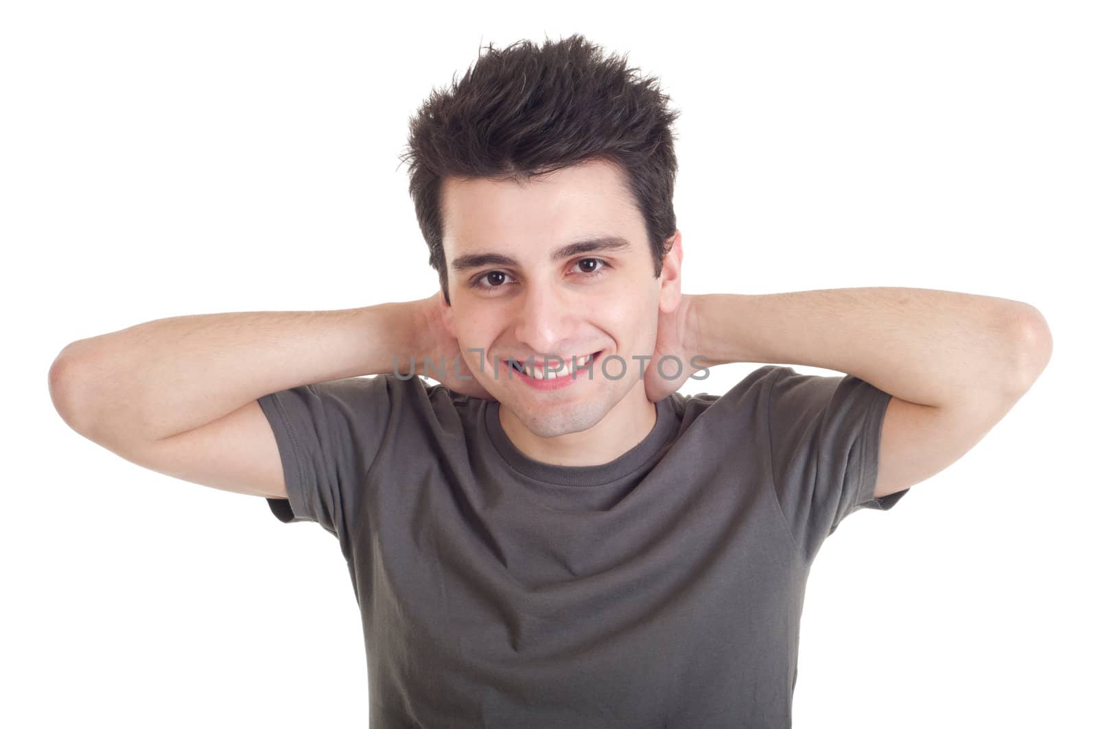 smiling casual man relaxing with hands behind back isolated on white