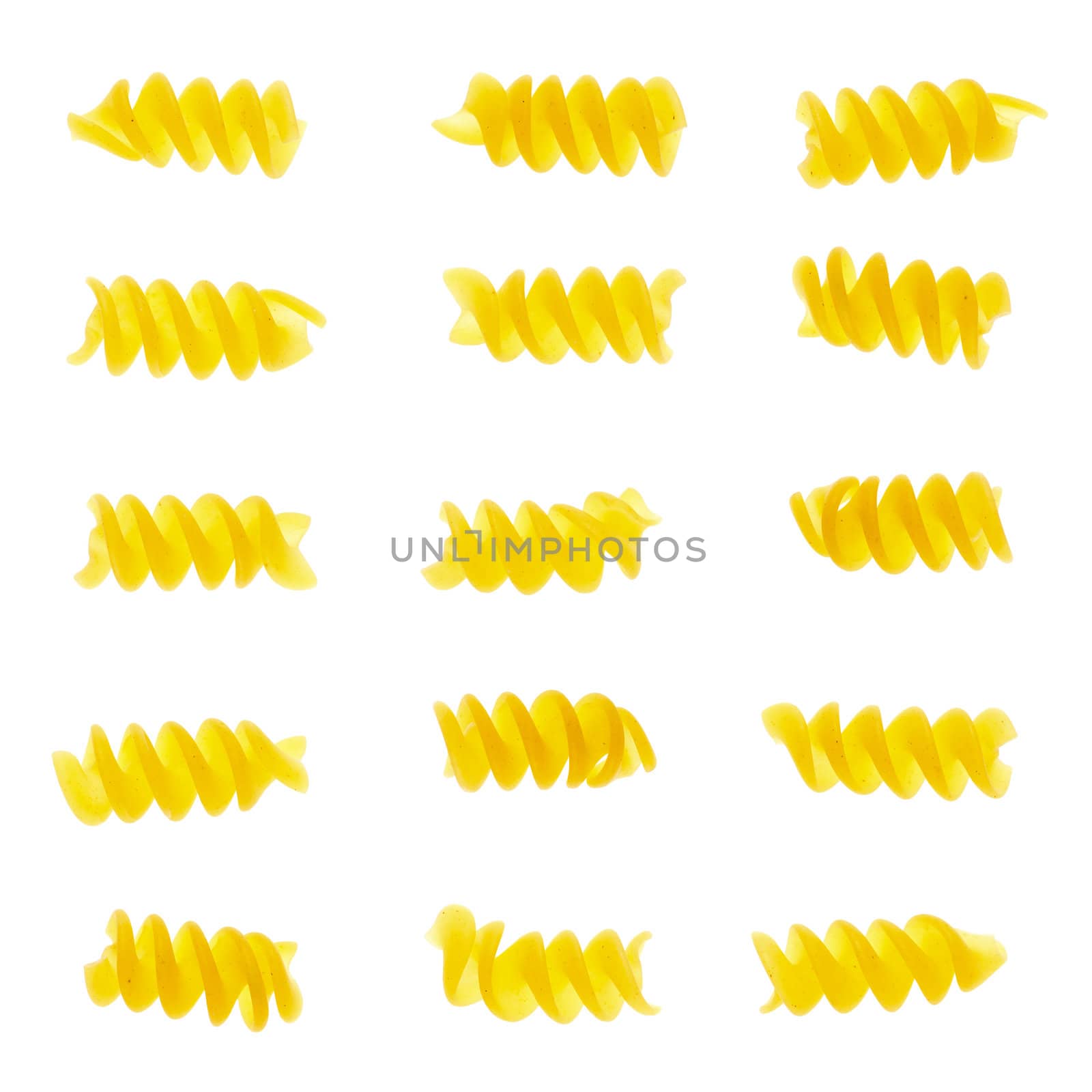 Set of fusilli pasta isolated on white background.