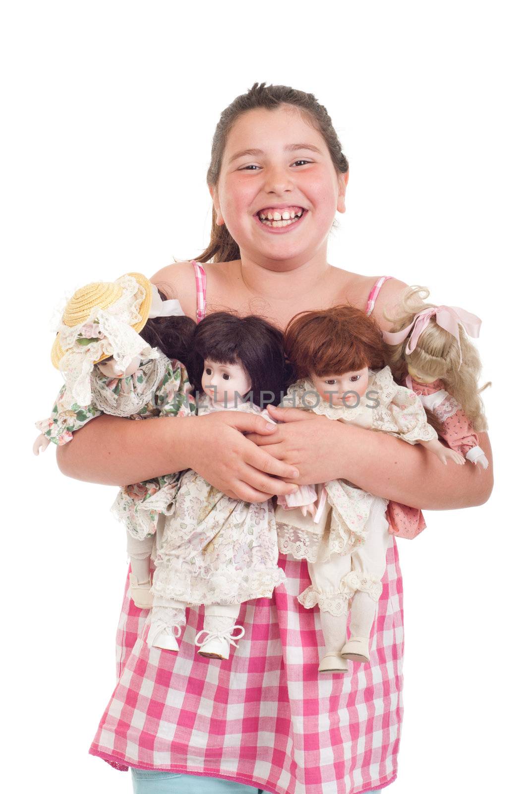 joyful little girl with her favorite dolls (isolated on white background) 