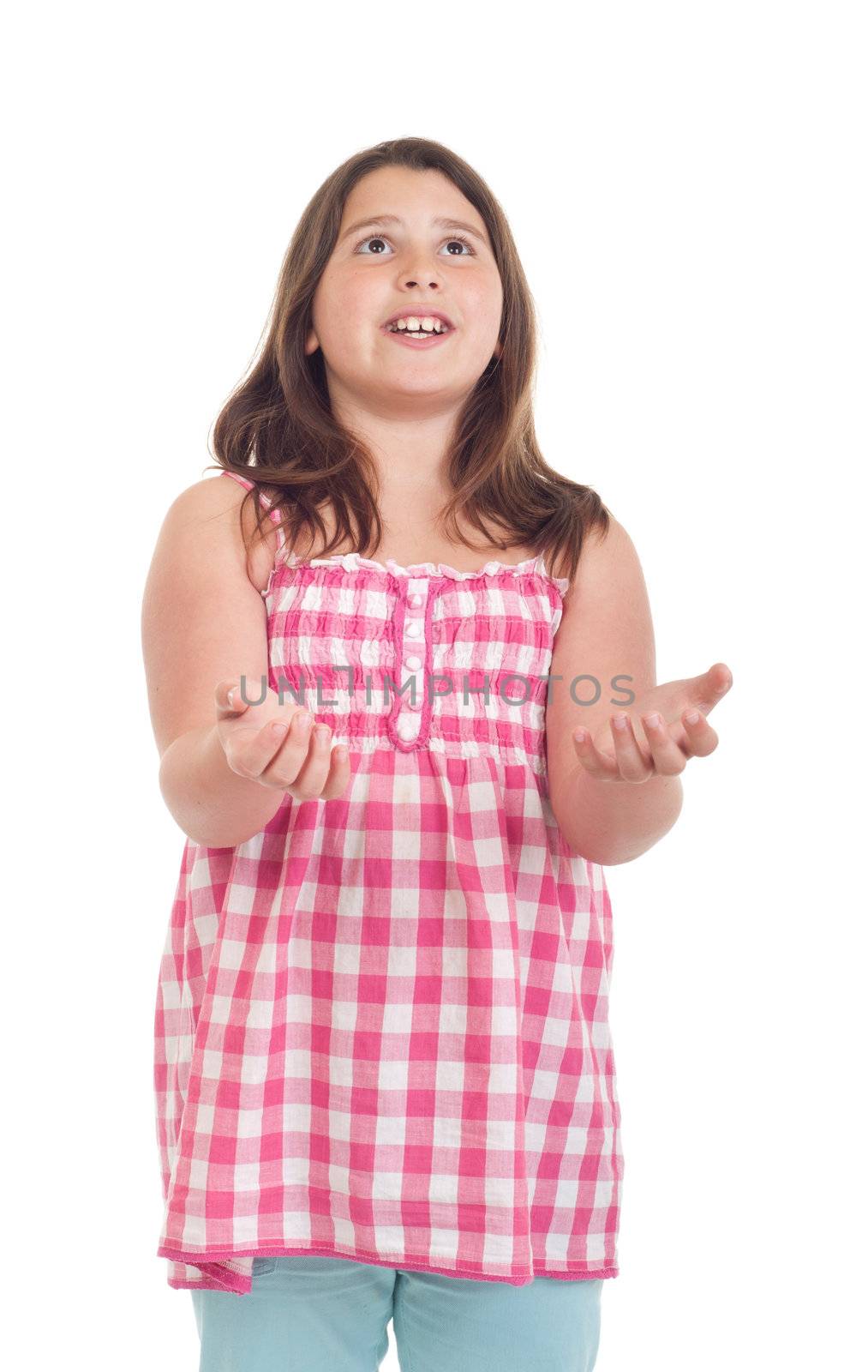 little girl with surprised expression with open hands waiting for something to fall (isolated on white background)
