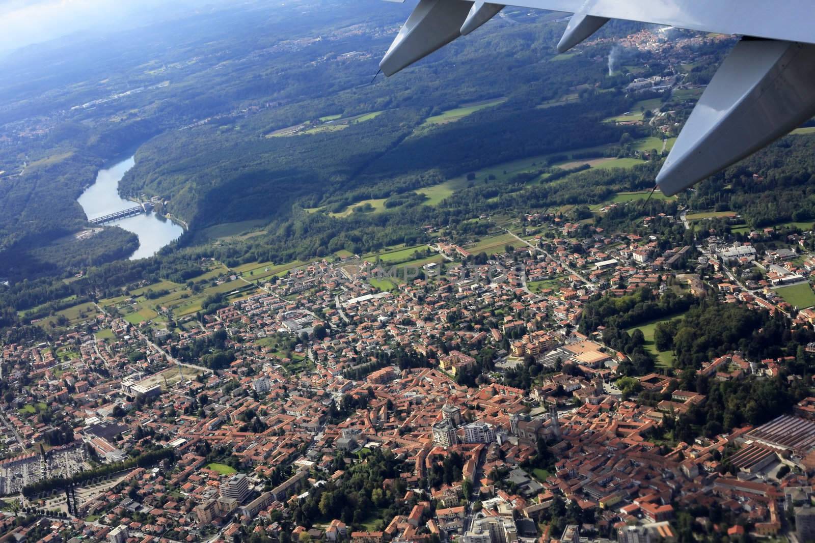 Suburb of Milan through a window of the plane