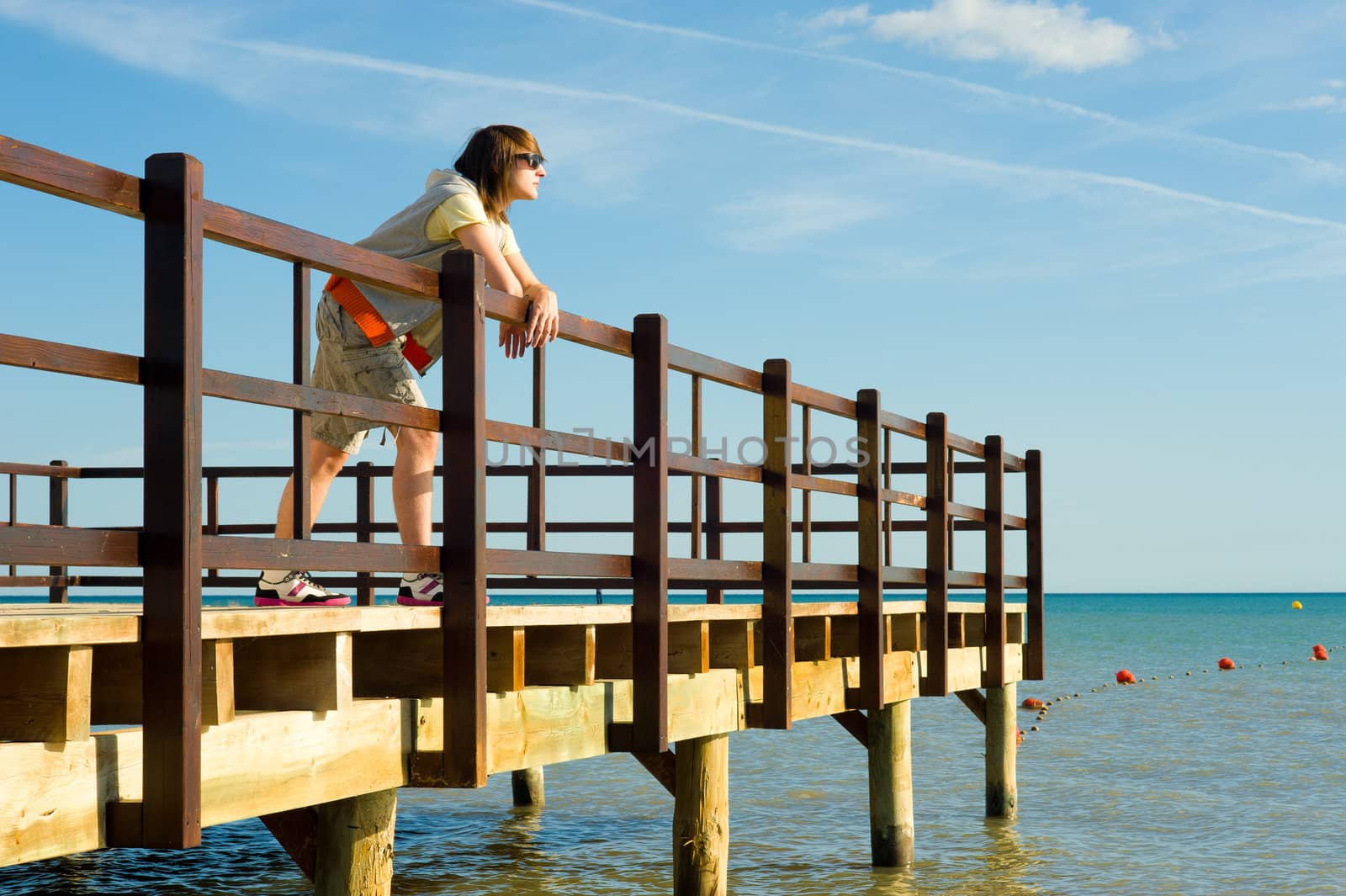 Teen looking out towards the horizon, a future concept