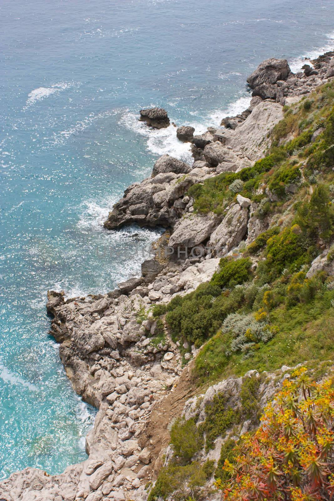 Coast of Capri Island, view of sea and sea-cliff