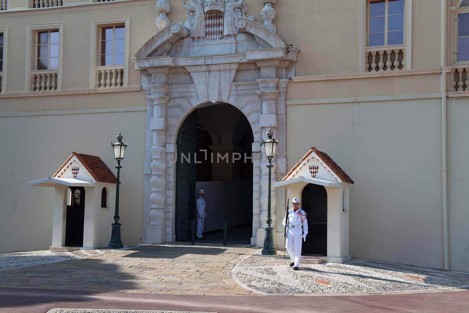 October 1st, 2009 - La Condamine distric, Monaco - The palace guards standing at attention at the main entrance.
