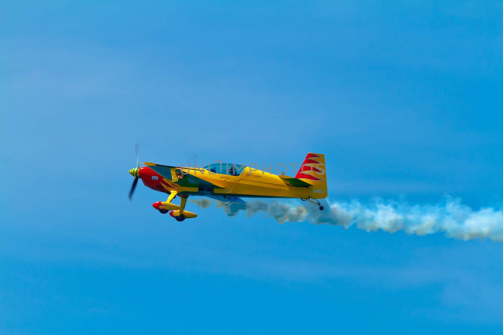 CADIZ, SPAIN-SEP 11: Aircraft Extra 300S of Melissa Pemberton taking part in an exhibition on the 4th airshow of Cadiz on Sep 11, 2011, in Cadiz, Spain