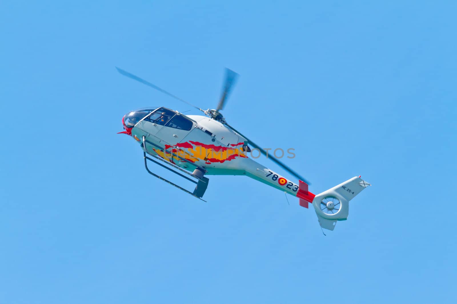 CADIZ, SPAIN-SEP 11: Helicopters of the Patrulla Aspa taking part in an exhibition on the 4th airshow of Cadiz on Sep 11, 2011, in Cadiz, Spain