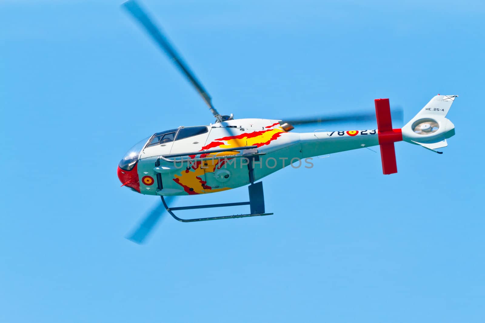 CADIZ, SPAIN-SEP 11: Helicopters of the Patrulla Aspa taking part in an exhibition on the 4th airshow of Cadiz on Sep 11, 2011, in Cadiz, Spain