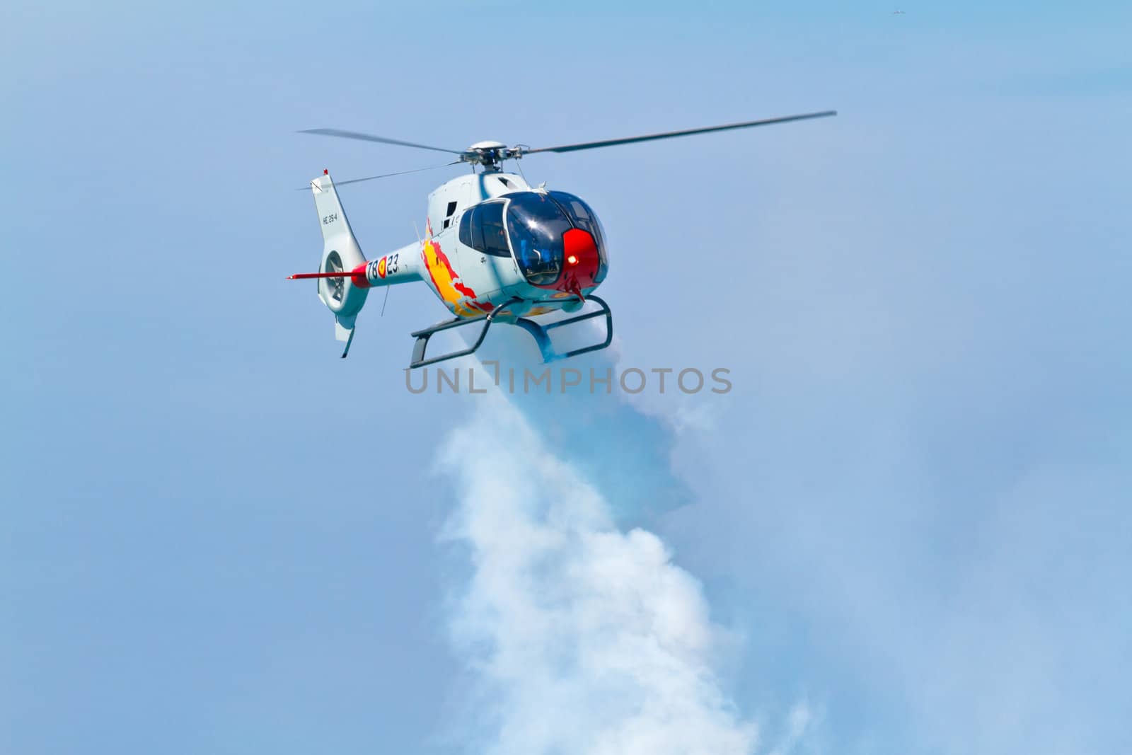 CADIZ, SPAIN-SEP 11: Helicopters of the Patrulla Aspa taking part in an exhibition on the 4th airshow of Cadiz on Sep 11, 2011, in Cadiz, Spain