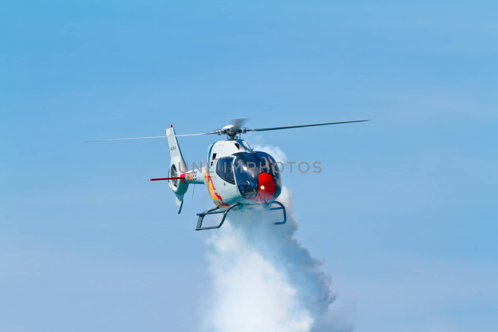CADIZ, SPAIN-SEP 11: Helicopters of the Patrulla Aspa taking part in an exhibition on the 4th airshow of Cadiz on Sep 11, 2011, in Cadiz, Spain