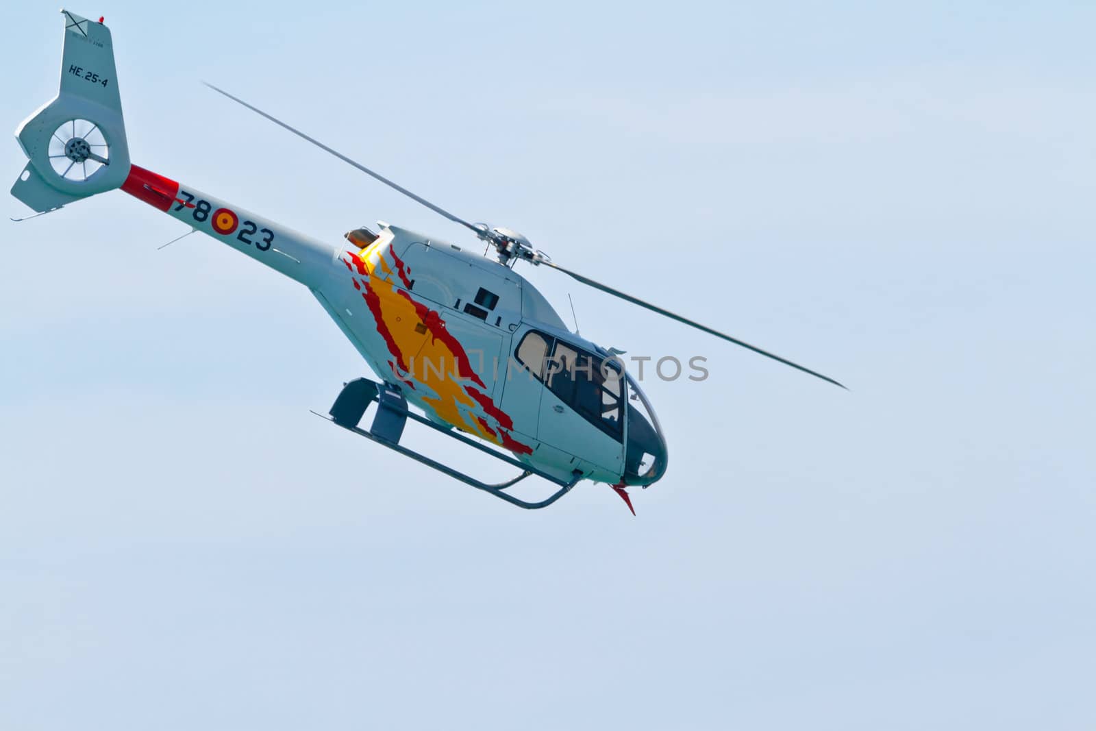 CADIZ, SPAIN-SEP 11: Helicopters of the Patrulla Aspa taking part in an exhibition on the 4th airshow of Cadiz on Sep 11, 2011, in Cadiz, Spain