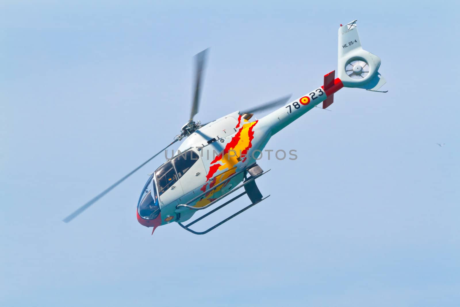 CADIZ, SPAIN-SEP 11: Helicopters of the Patrulla Aspa taking part in an exhibition on the 4th airshow of Cadiz on Sep 11, 2011, in Cadiz, Spain