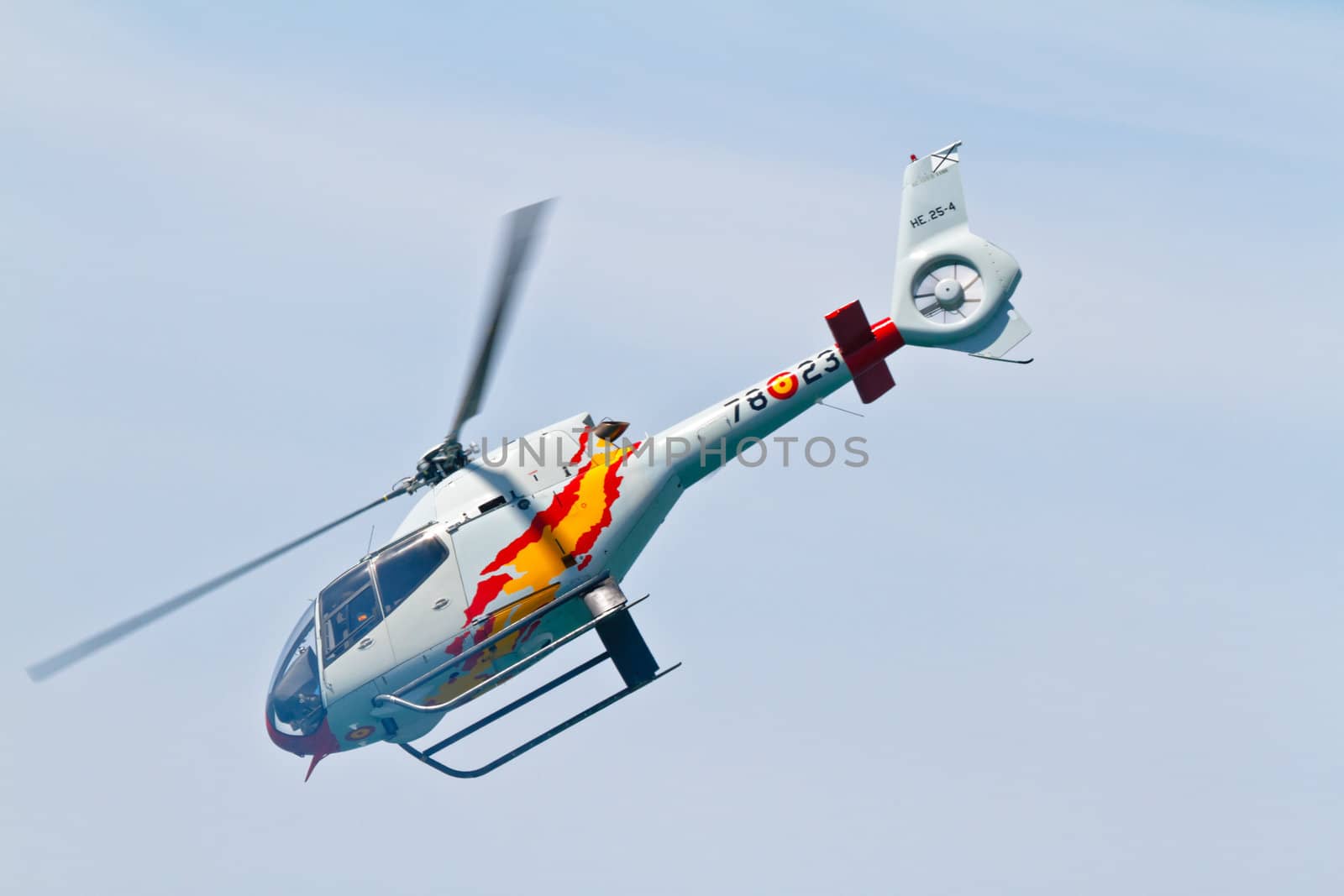 CADIZ, SPAIN-SEP 11: Helicopters of the Patrulla Aspa taking part in an exhibition on the 4th airshow of Cadiz on Sep 11, 2011, in Cadiz, Spain