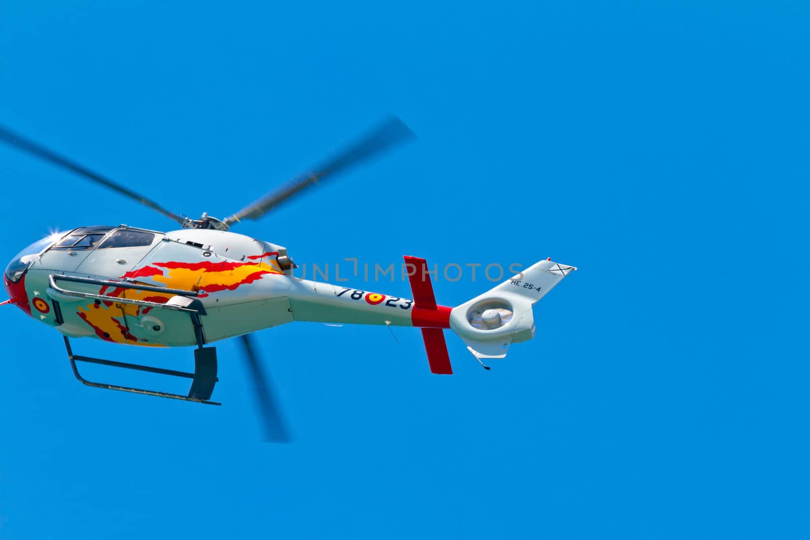 CADIZ, SPAIN-SEP 11: Helicopters of the Patrulla Aspa taking part in an exhibition on the 4th airshow of Cadiz on Sep 11, 2011, in Cadiz, Spain