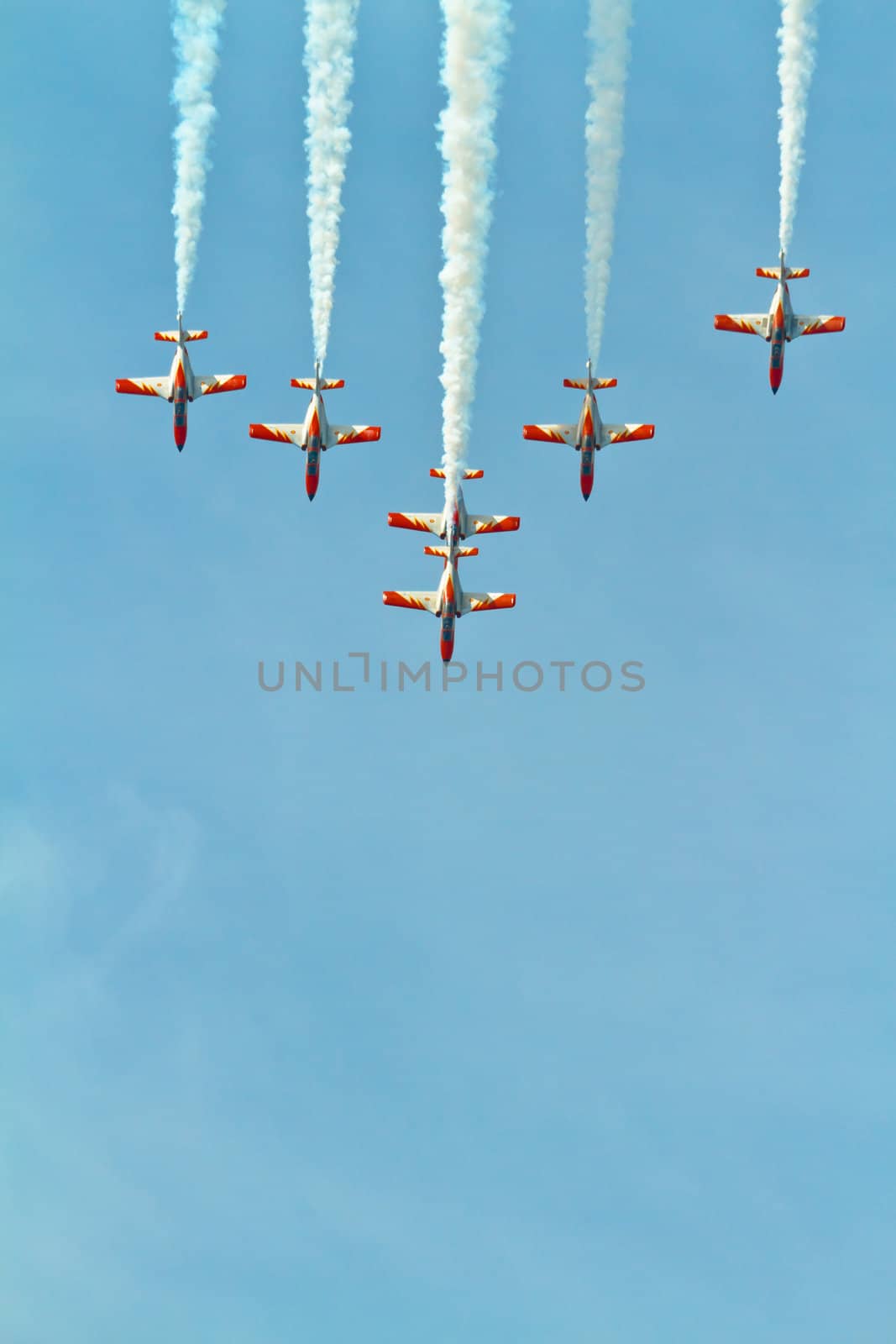 CADIZ, SPAIN-SEP 11: Aircrafts of the Patrulla Aguila taking part in an exhibition on the 4th airshow of Cadiz on Sep 11, 2011, in Cadiz, Spain