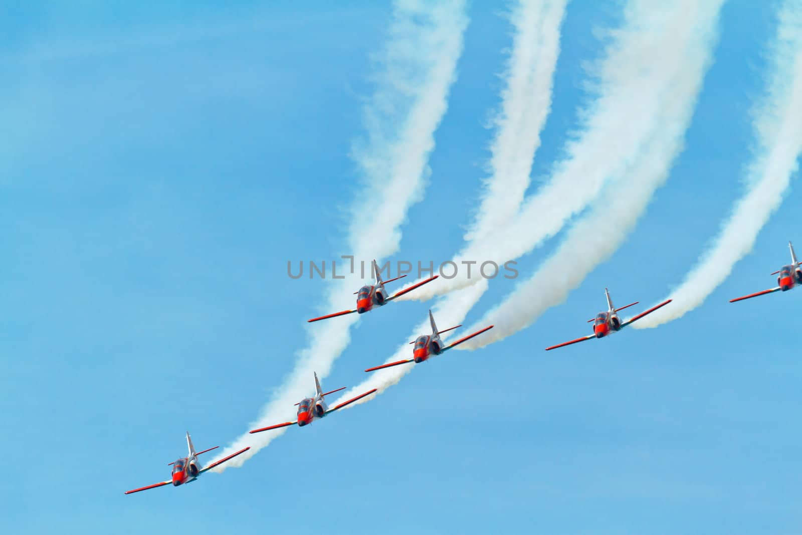 CADIZ, SPAIN-SEP 11: Aircrafts of the Patrulla Aguila taking part in an exhibition on the 4th airshow of Cadiz on Sep 11, 2011, in Cadiz, Spain