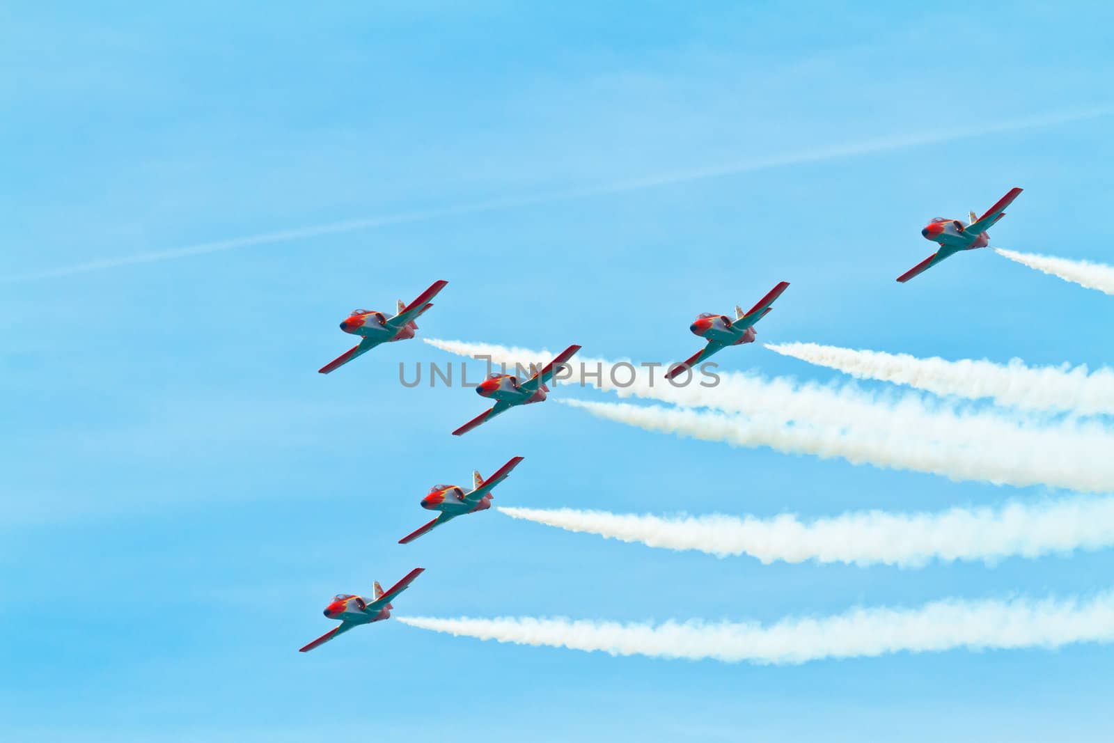 CADIZ, SPAIN-SEP 11: Aircrafts of the Patrulla Aguila taking part in an exhibition on the 4th airshow of Cadiz on Sep 11, 2011, in Cadiz, Spain