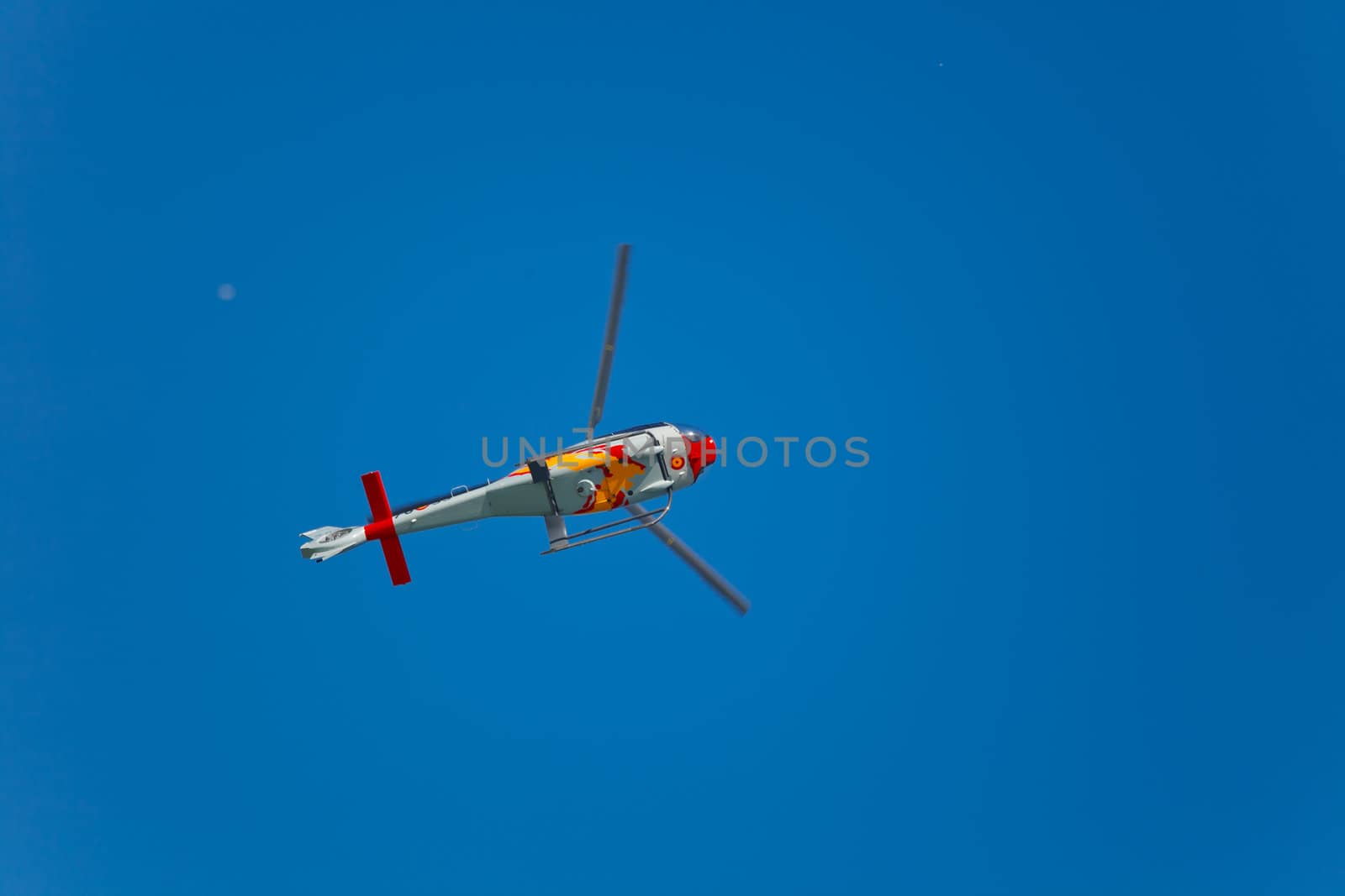 CADIZ, SPAIN-SEP 10: Helicopters of the Patrulla Aspa taking part in an test on the 3rd airshow of Cadiz on Sep 10, 2010, in Cadiz, Spain