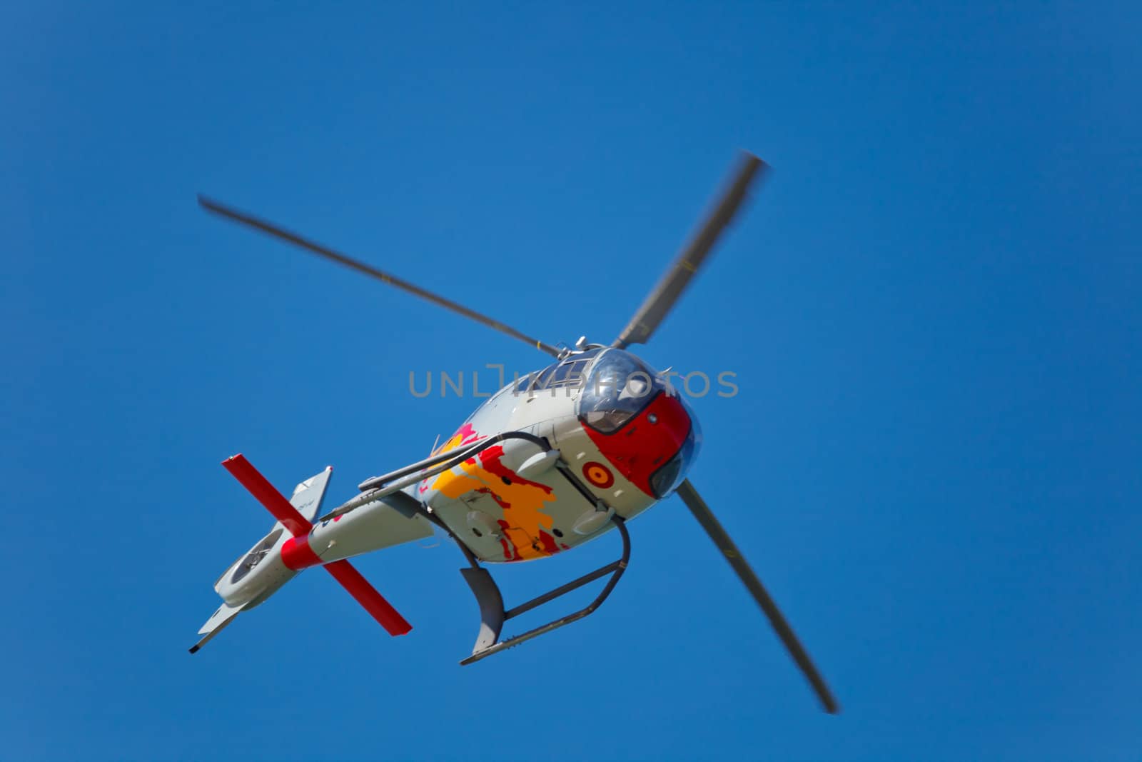 CADIZ, SPAIN-SEP 10: Helicopters of the Patrulla Aspa taking part in an test on the 3rd airshow of Cadiz on Sep 10, 2010, in Cadiz, Spain