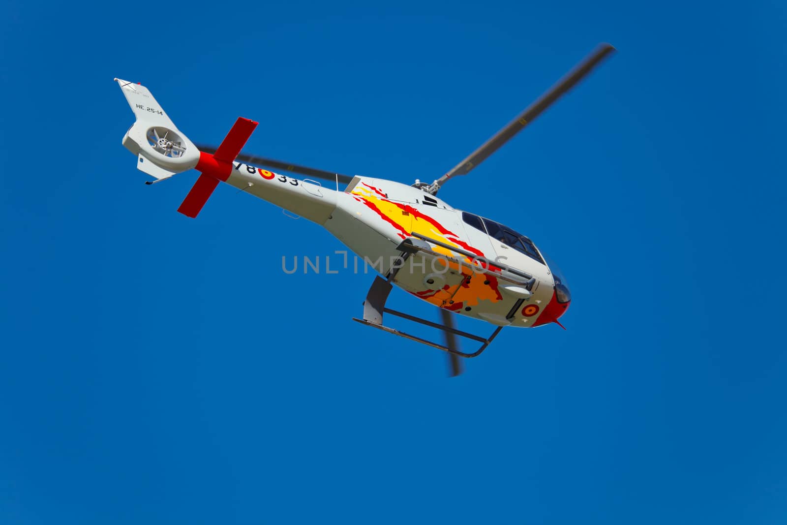 CADIZ, SPAIN-SEP 10: Helicopters of the Patrulla Aspa taking part in an test on the 3rd airshow of Cadiz on Sep 10, 2010, in Cadiz, Spain