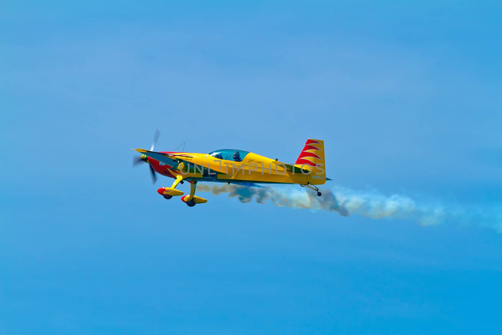 CADIZ, SPAIN-SEP 11: Aircraft Extra 300S of Melissa Pemberton taking part in an exhibition on the 4th airshow of Cadiz on Sep 11, 2011, in Cadiz, Spain