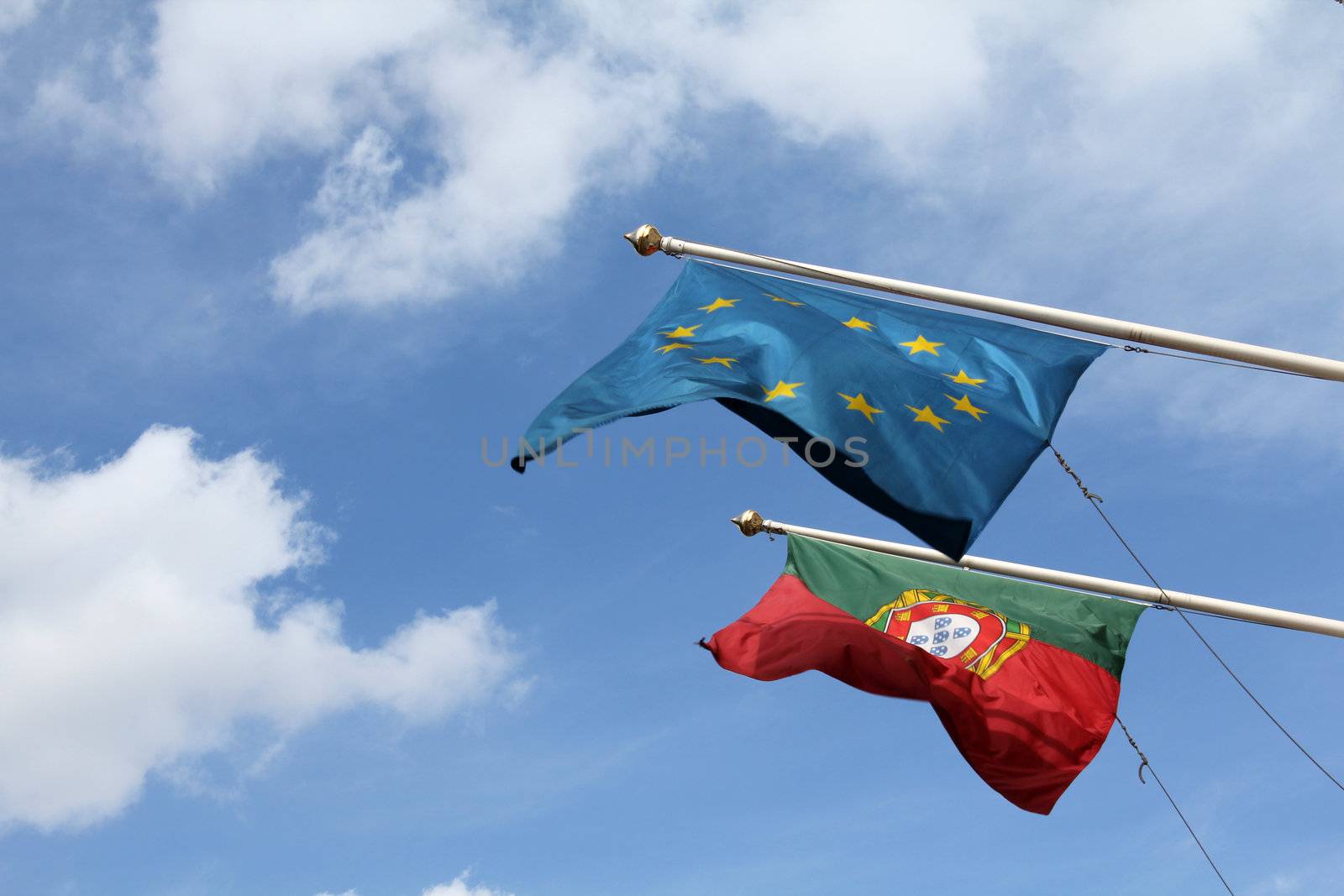 portuguse and eu flag during the day