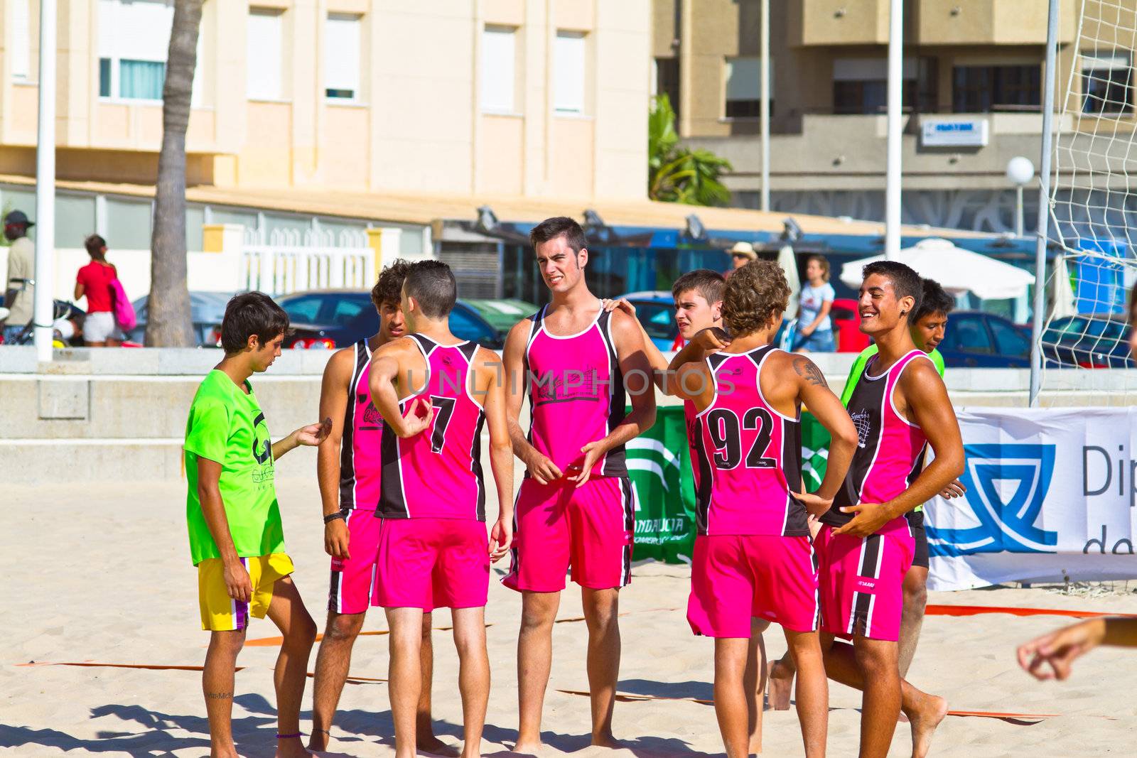 CADIZ, SPAIN - JULY 19: Unidentified players compete in a match between Autoescuela Barquin and CadizSur Seguros BMPY in the 19th league of beach handball of Cadiz on July 19, 2011 in Cadiz, Spain