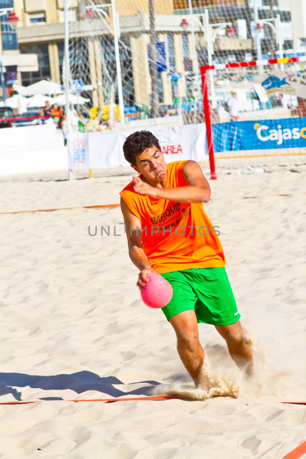 CADIZ, SPAIN - JULY 19: Unidentified players compete in a match between Autoescuela Barquin and CadizSur Seguros BMPY in the 19th league of beach handball of Cadiz on July 19, 2011 in Cadiz, Spain