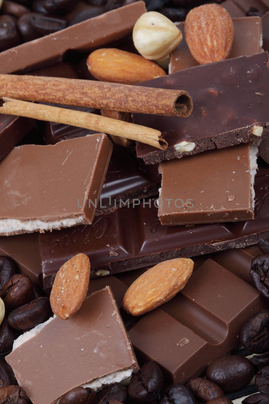 close up of chocolate, hazelnuts and coffee beans, shallow dof 