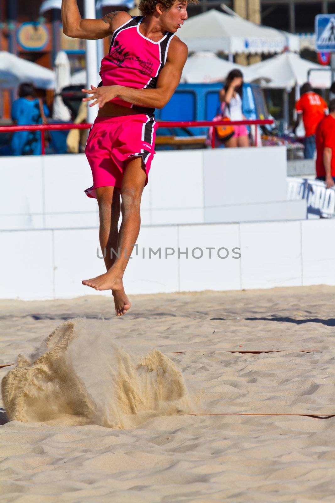 CADIZ, SPAIN - JULY 19: Unidentified players compete in a match between Autoescuela Barquin and CadizSur Seguros BMPY in the 19th league of beach handball of Cadiz on July 19, 2011 in Cadiz, Spain