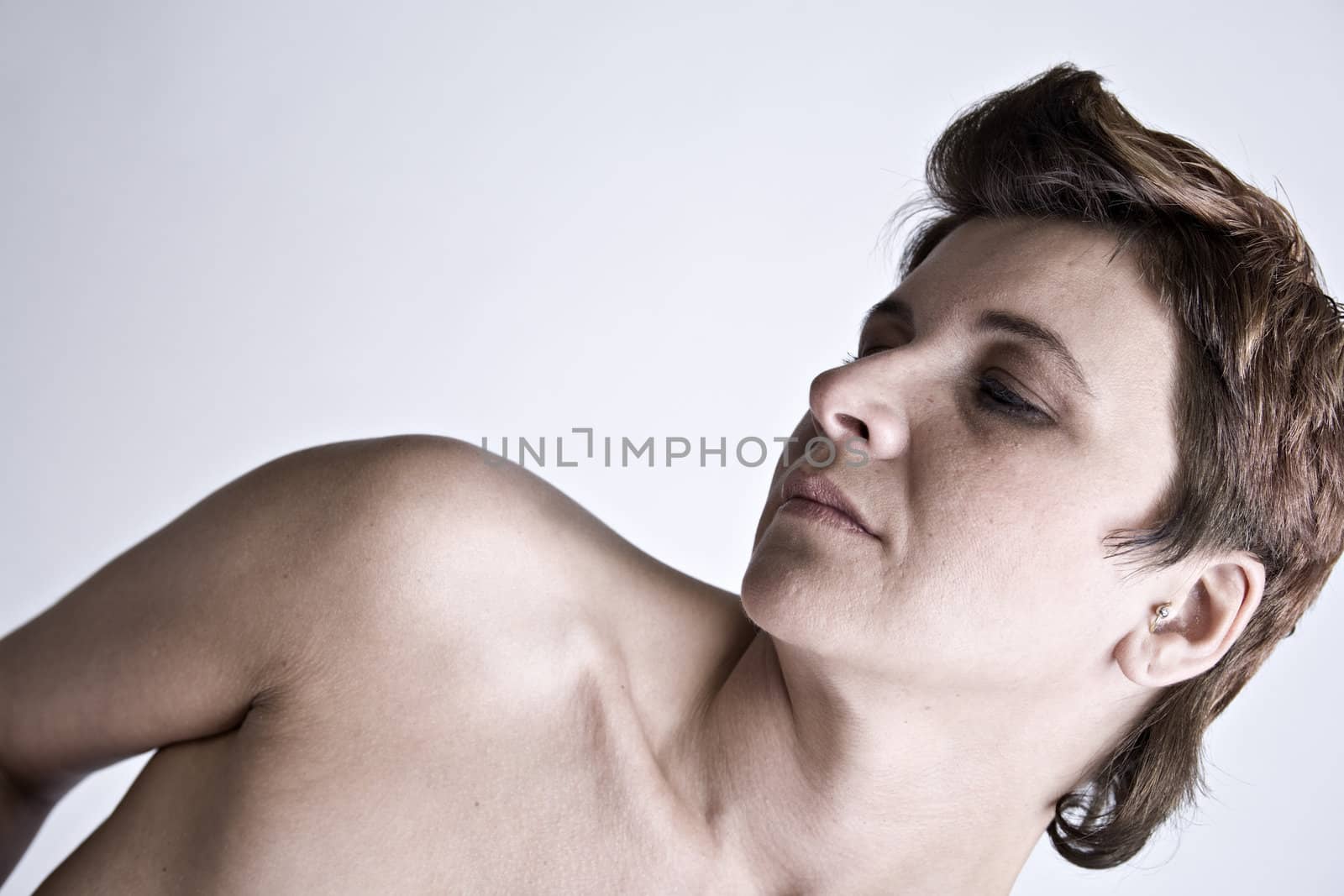 Adult woman portraits taken in the photo studio on a white background