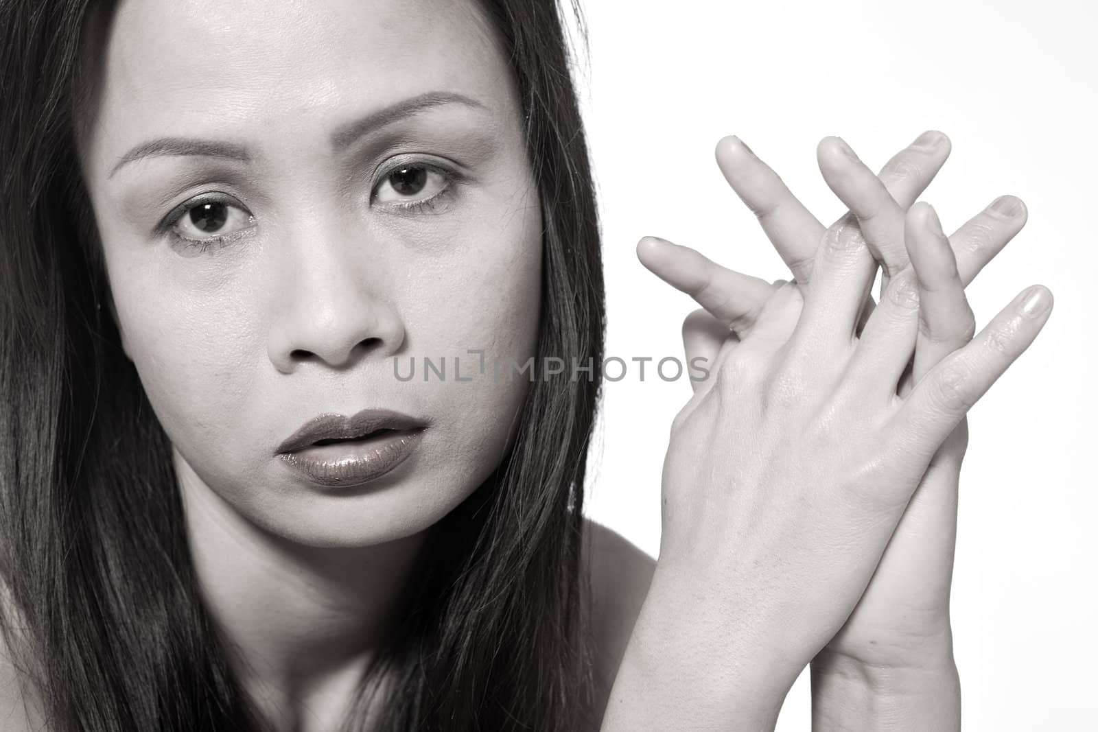 Studio portrait of a asian girl awaiting