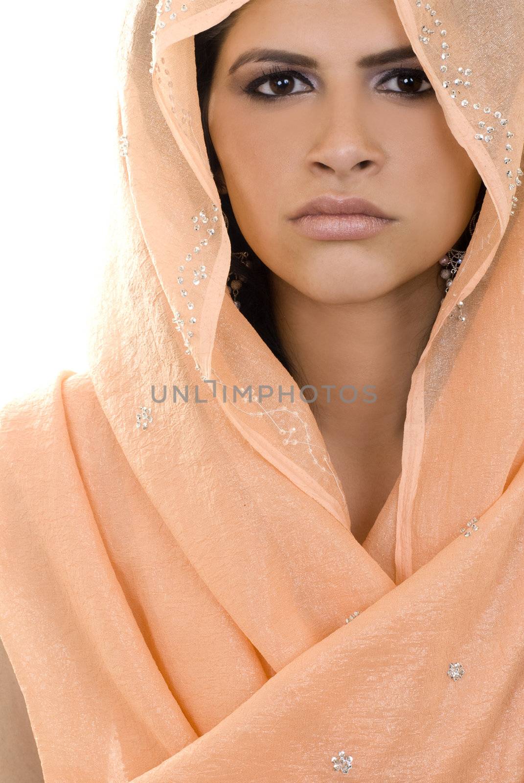 A young ethnic woman in a sari.