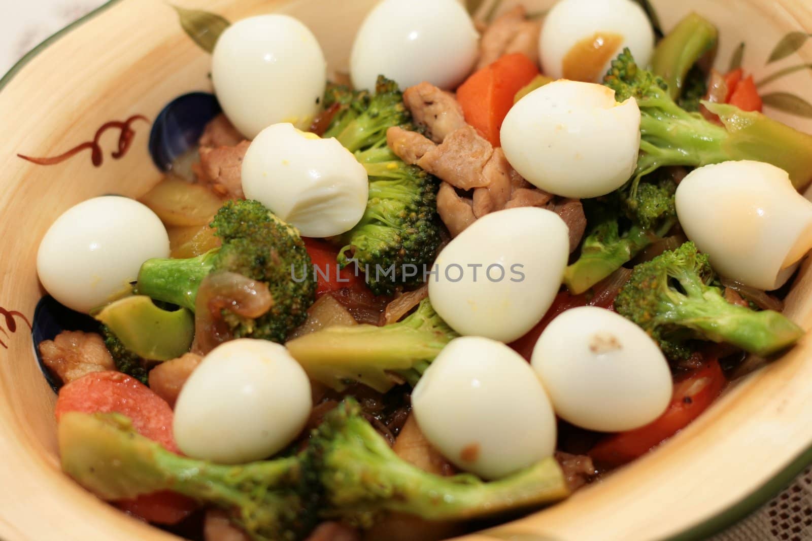 close up of broccoli with quail eggs 
