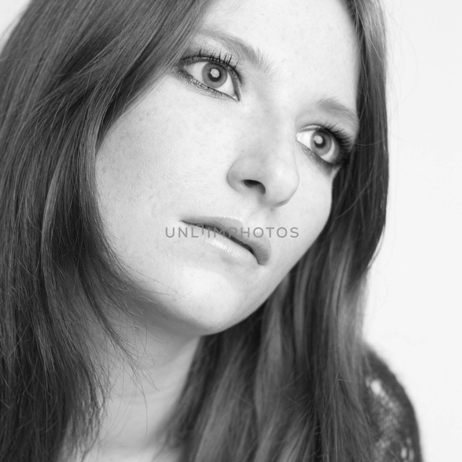 Studio portrait of a natural redhead in duo-tone